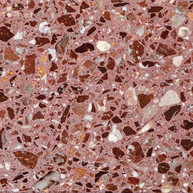Red-brown cast concrete flecked with pale stone aggregate