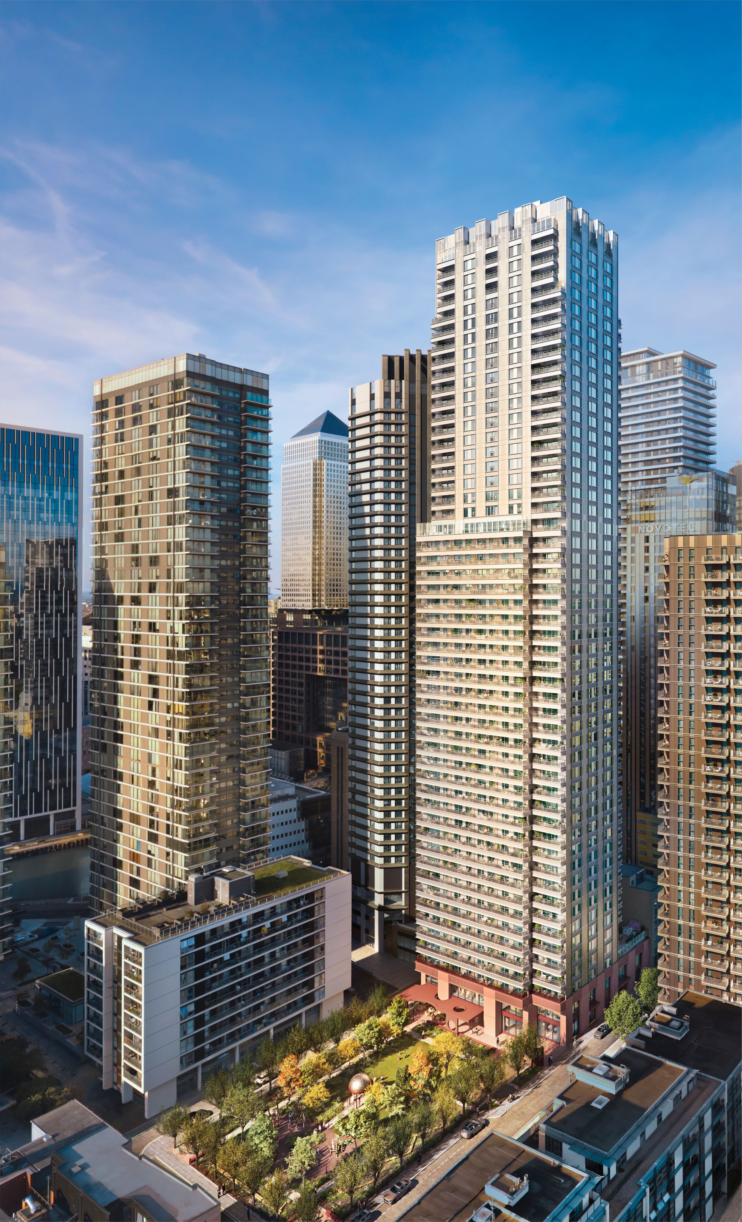 Planted rooftop garden framed by tall city towers