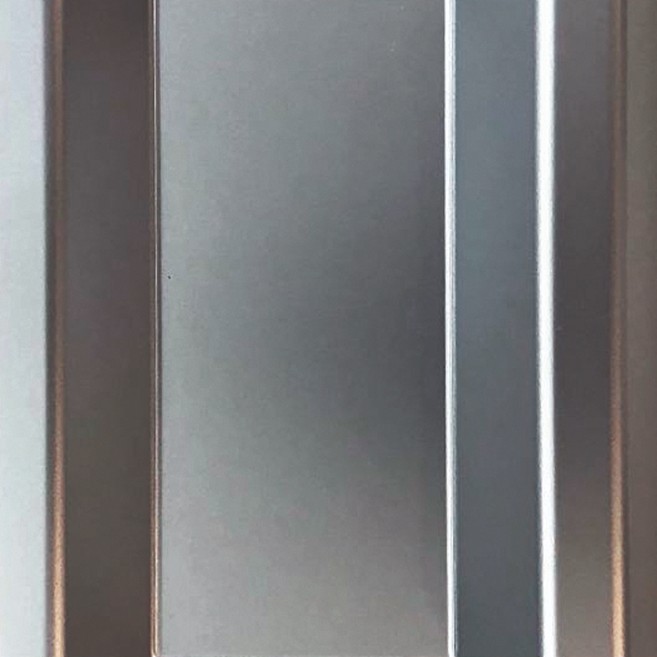Vertical aluminium fins catching light and deep shadow