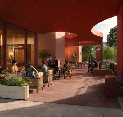 Residents at tables on the garden terrace at dusk