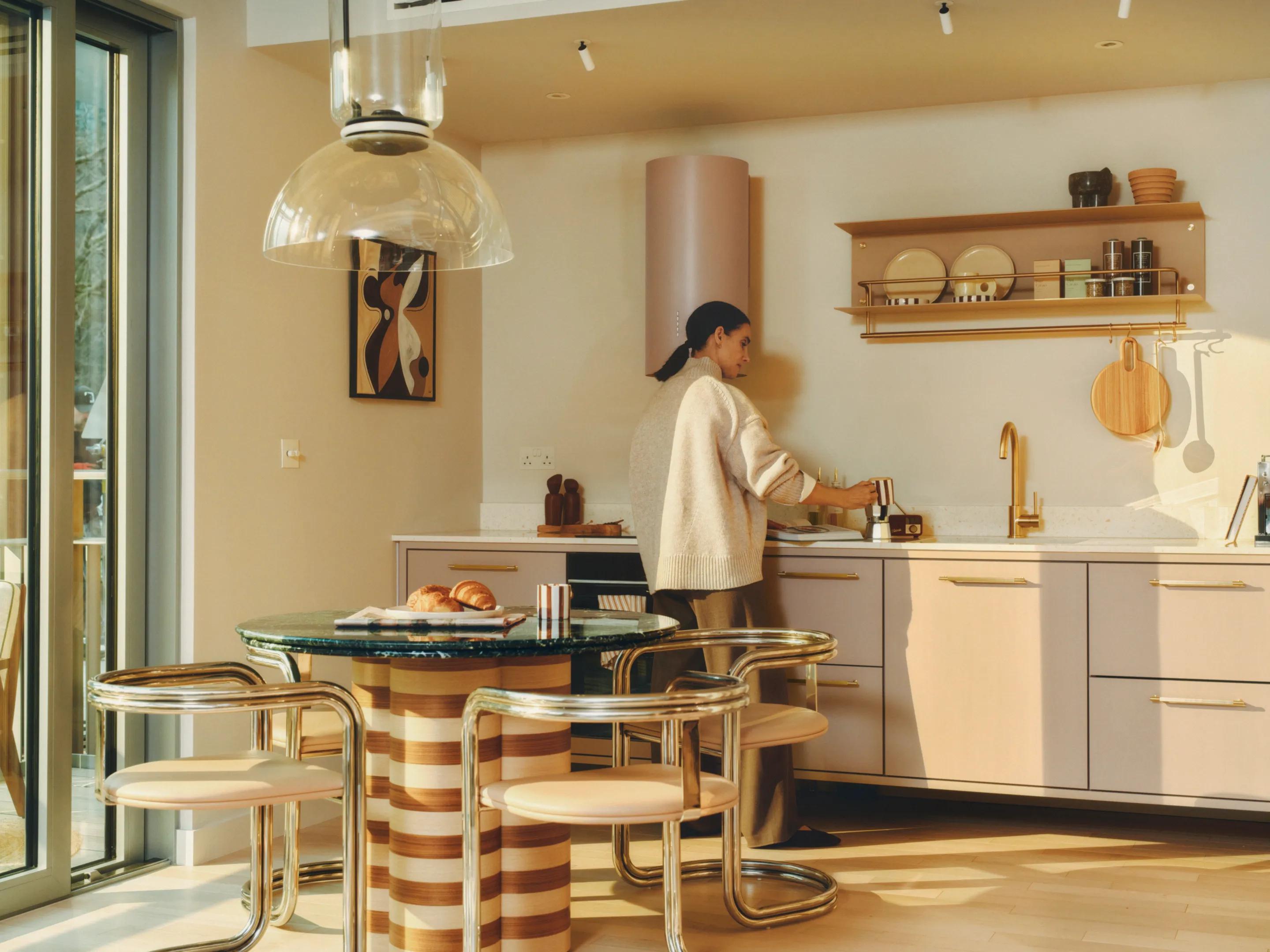 Kitchen and dining space inside a 25 Cuba apartment