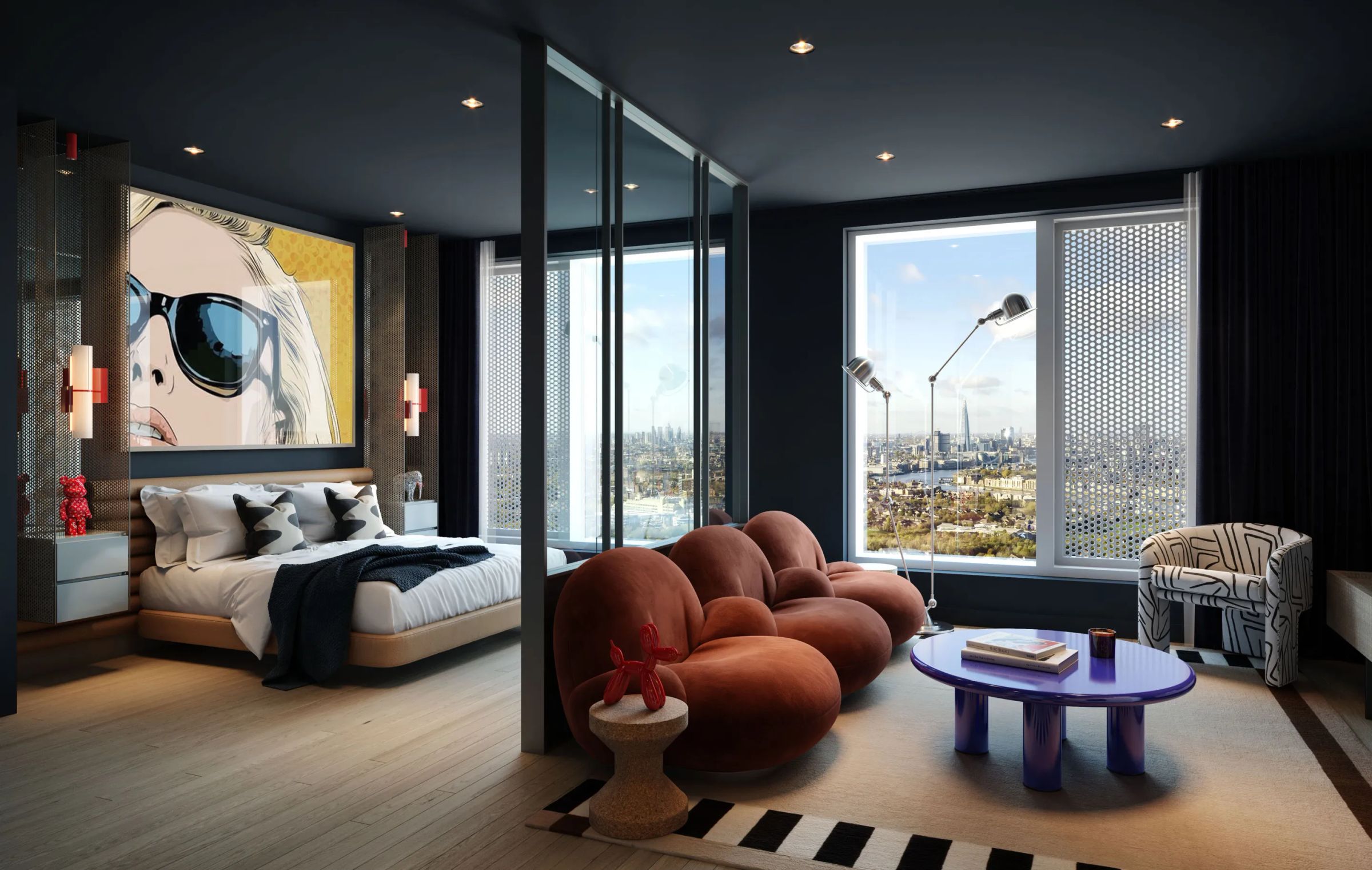 Open-plan bedroom and lounge with floor-to-ceiling city views