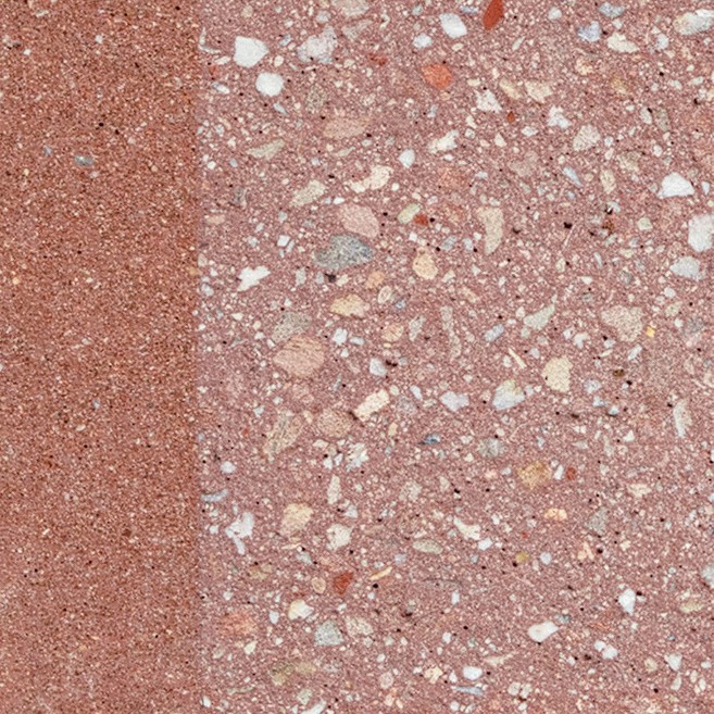 Deep pink concrete set with chunky red, white and black aggregate