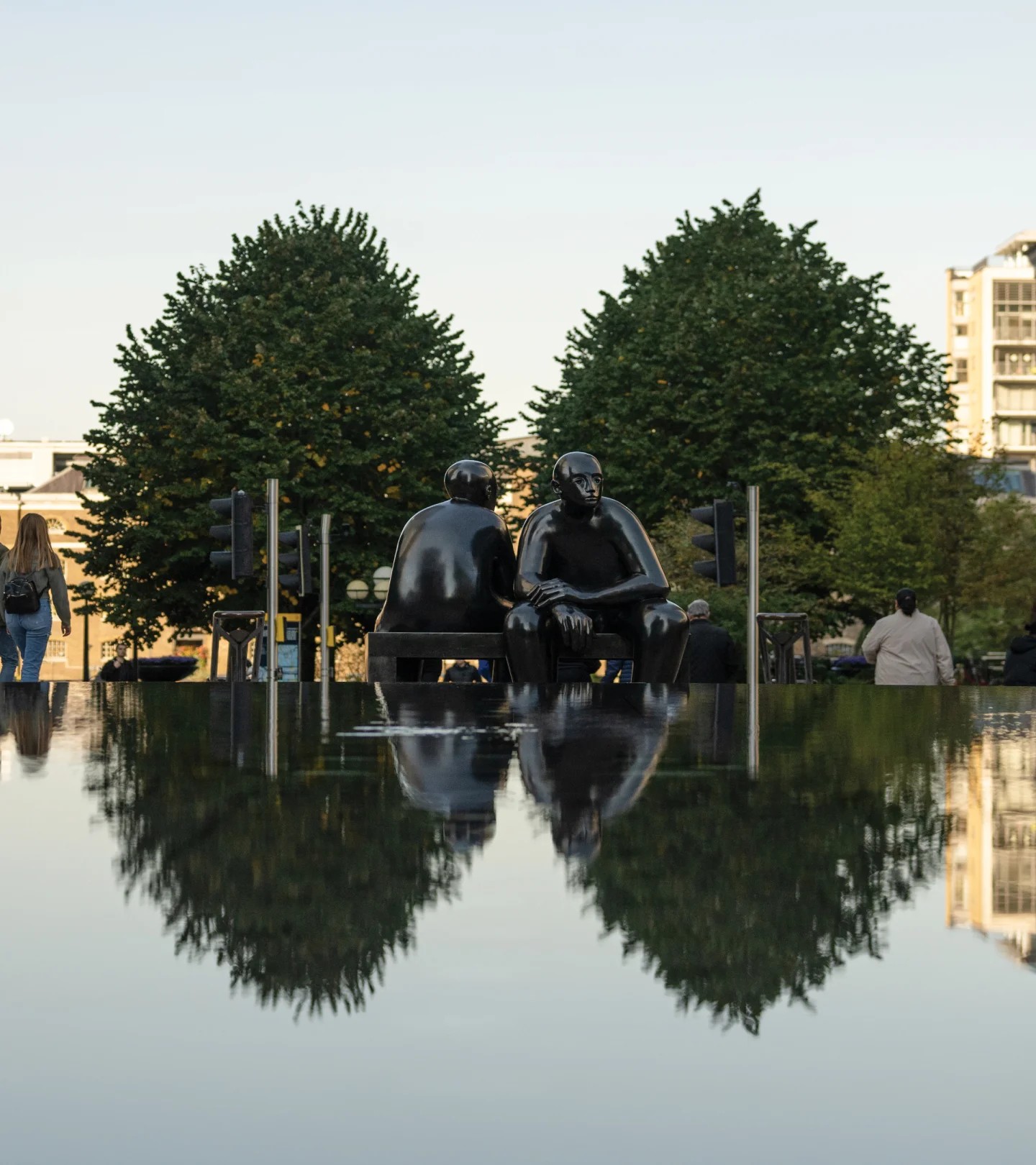 Sculpture mirrored in a still reflecting pool