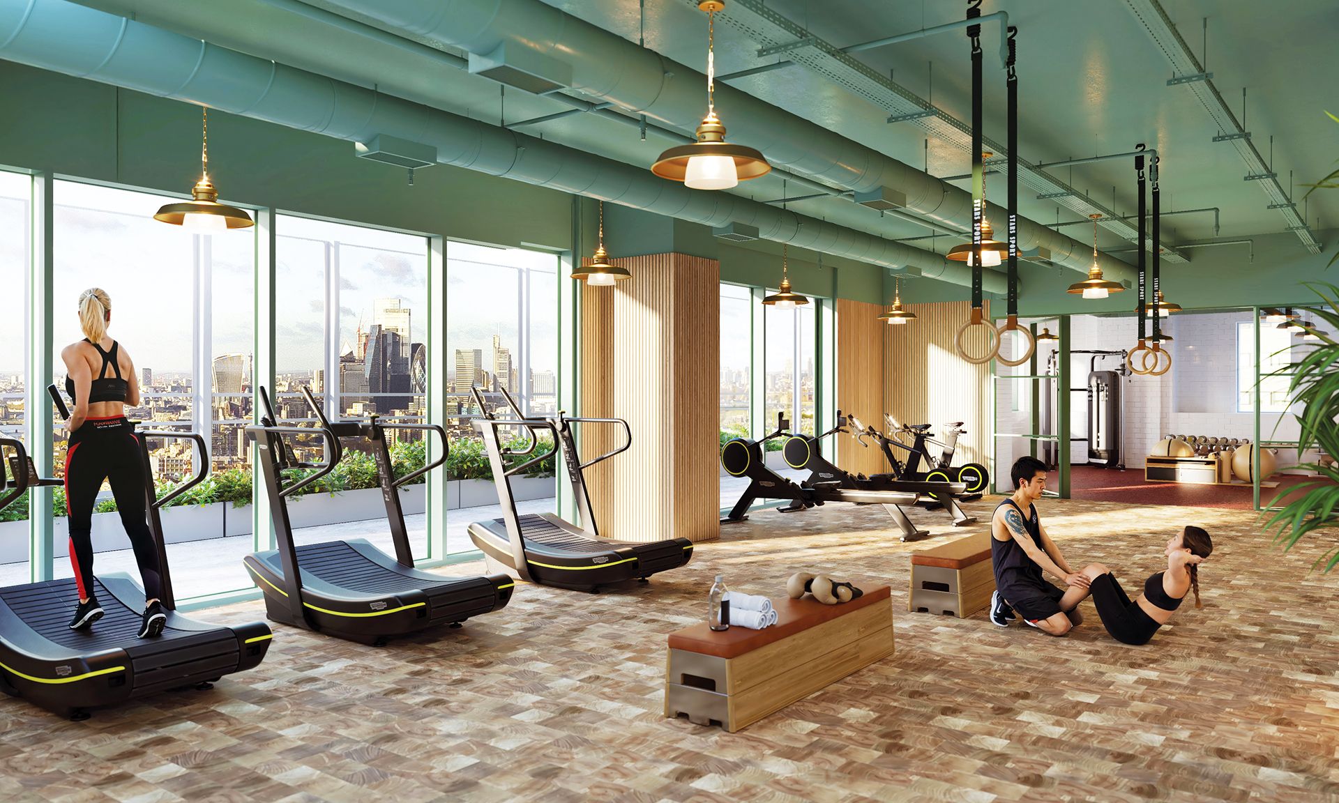 Treadmills and weights in the Level 32 gym