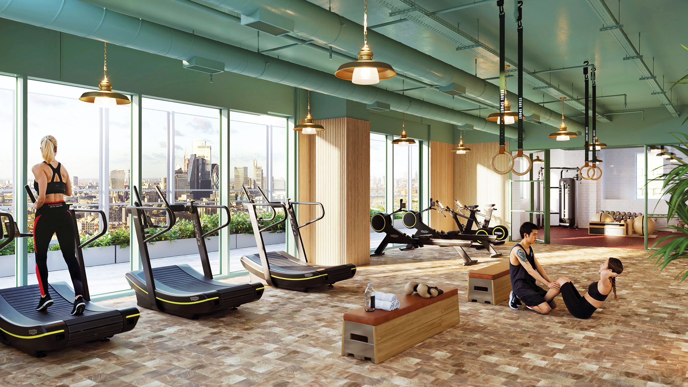 Treadmills and weights in the Level 32 gym