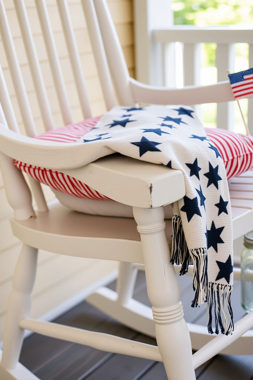 Red Ticking Stripe Cushion on White Rocking Chair With Star Throw – seasonal — spring + other seasonal — spring + other decor · 4th of July Porch Decor: 14 Festive Front Door Designs for Independence Day