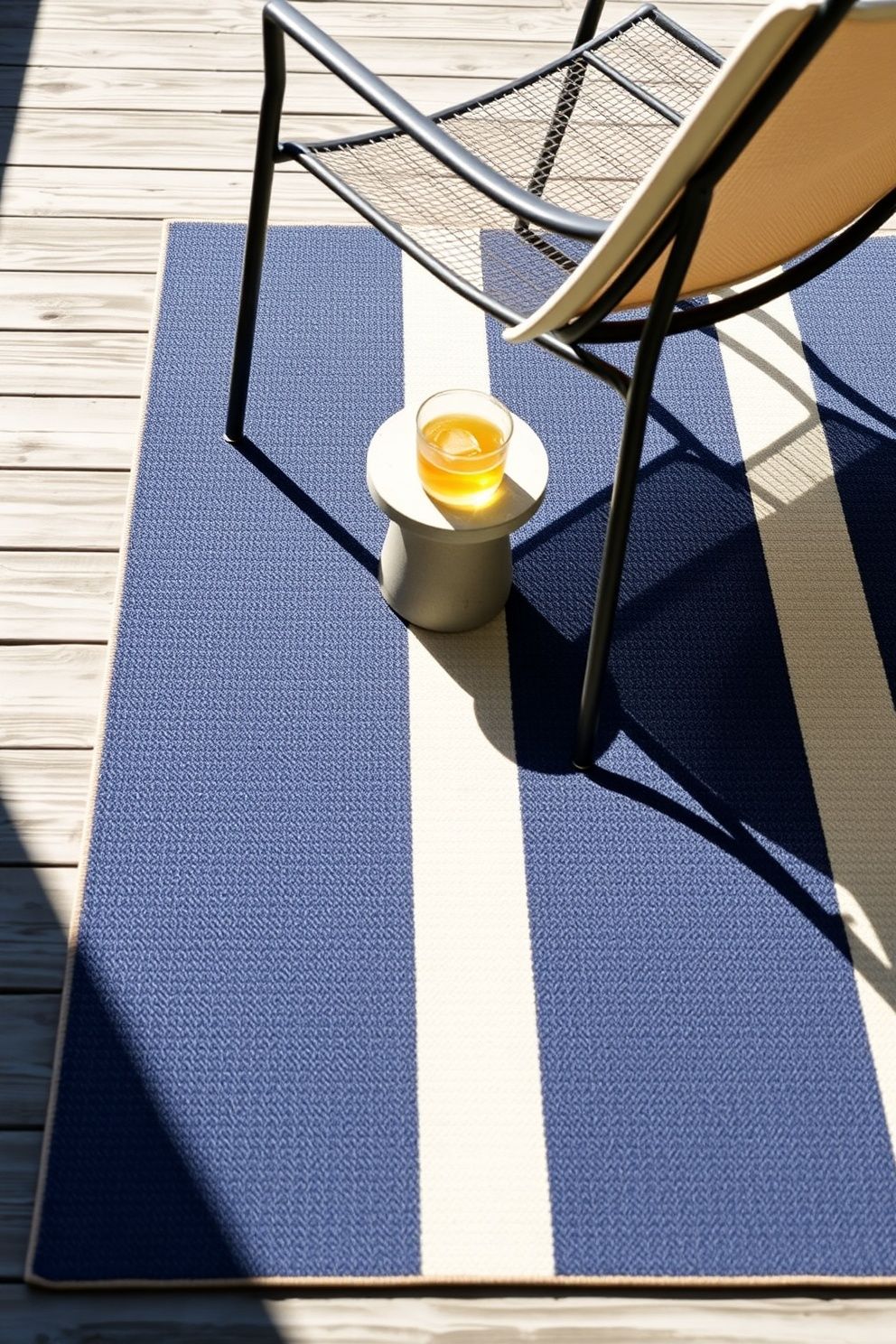 An Outdoor Rug in Navy Stripe to Anchor the Seating Area – seasonal — spring + other seasonal — spring + other decor · 4th of July Home Decor: 16 Patriotic Designs That Celebrate America in Style