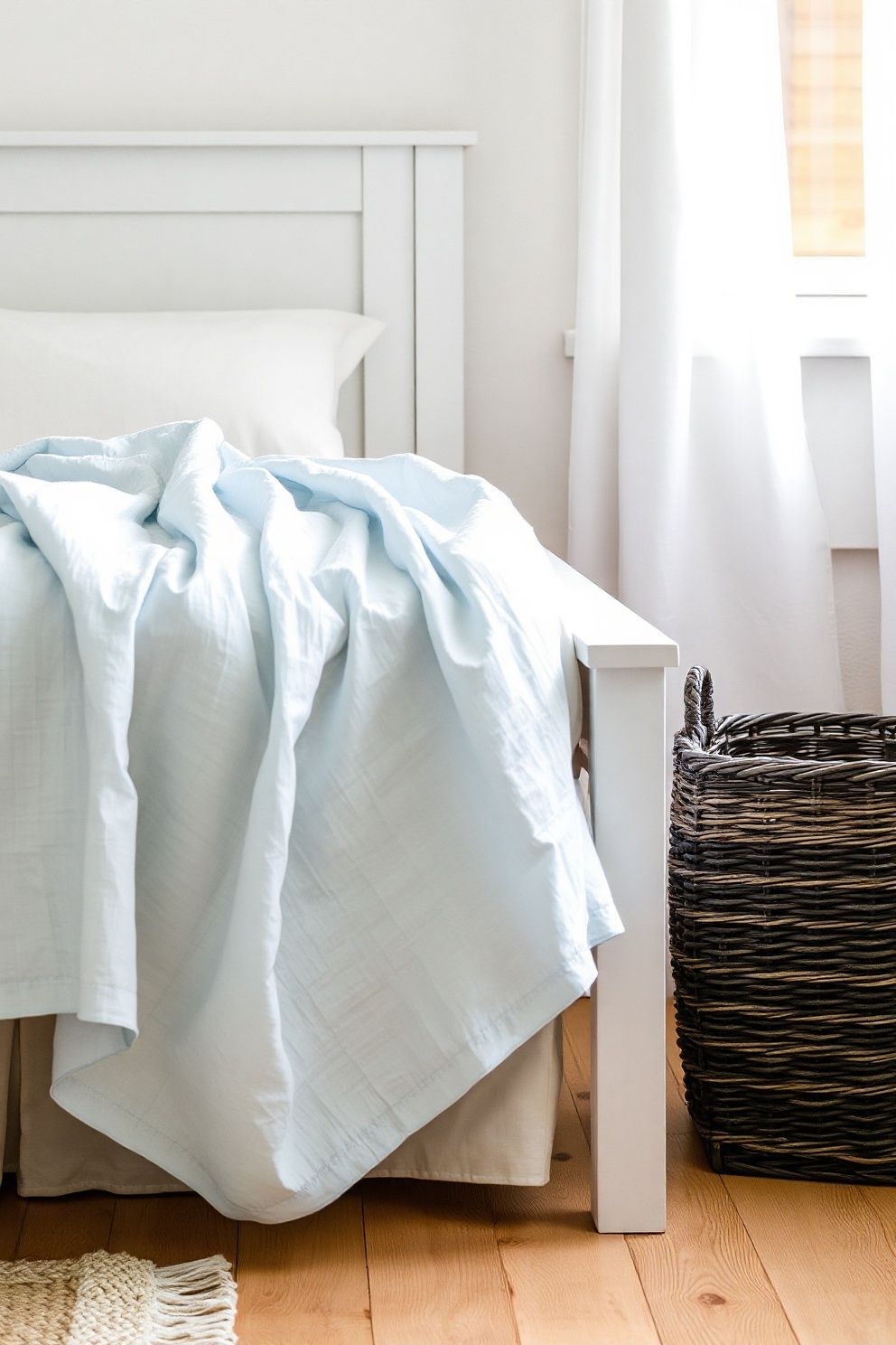 A Crinkle Cotton Gauze Throw in Pale Ocean Blue – coastal — bedroom coastal — bedroom decor · Coastal Bedroom Decor: 18 Small Accessories That Make Every Inch Feel Beachy