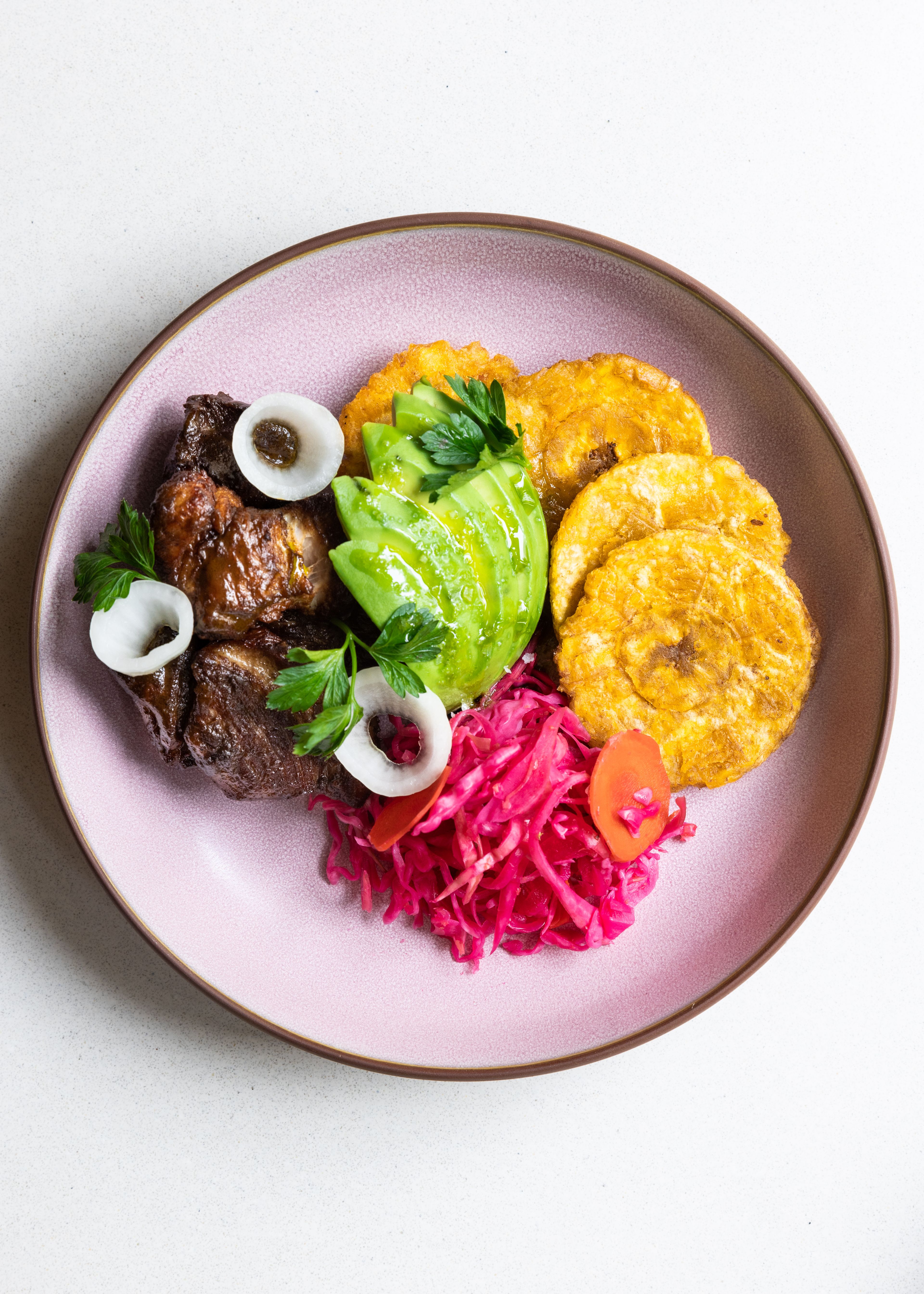 Gourdet’s griyo twice-cooked pork at Kann (photo: Eva Kosmas Flores)