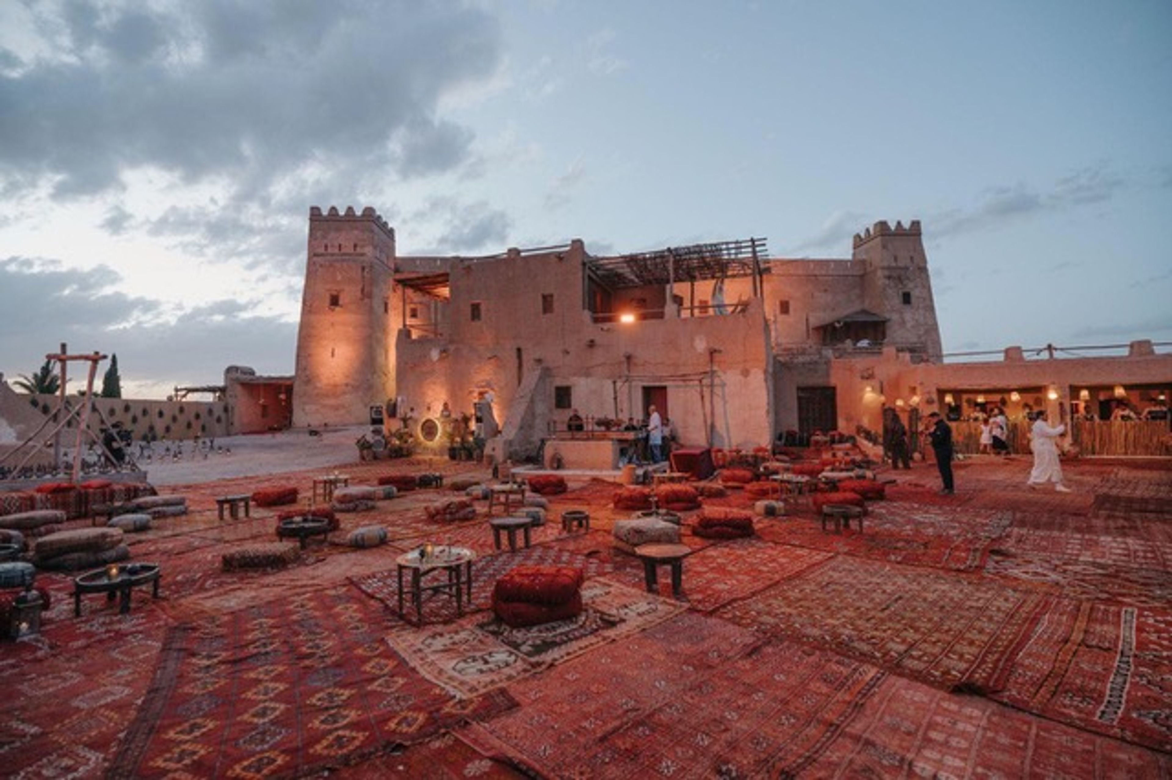 Outdoor courtyard with castle in Marrakesh in background