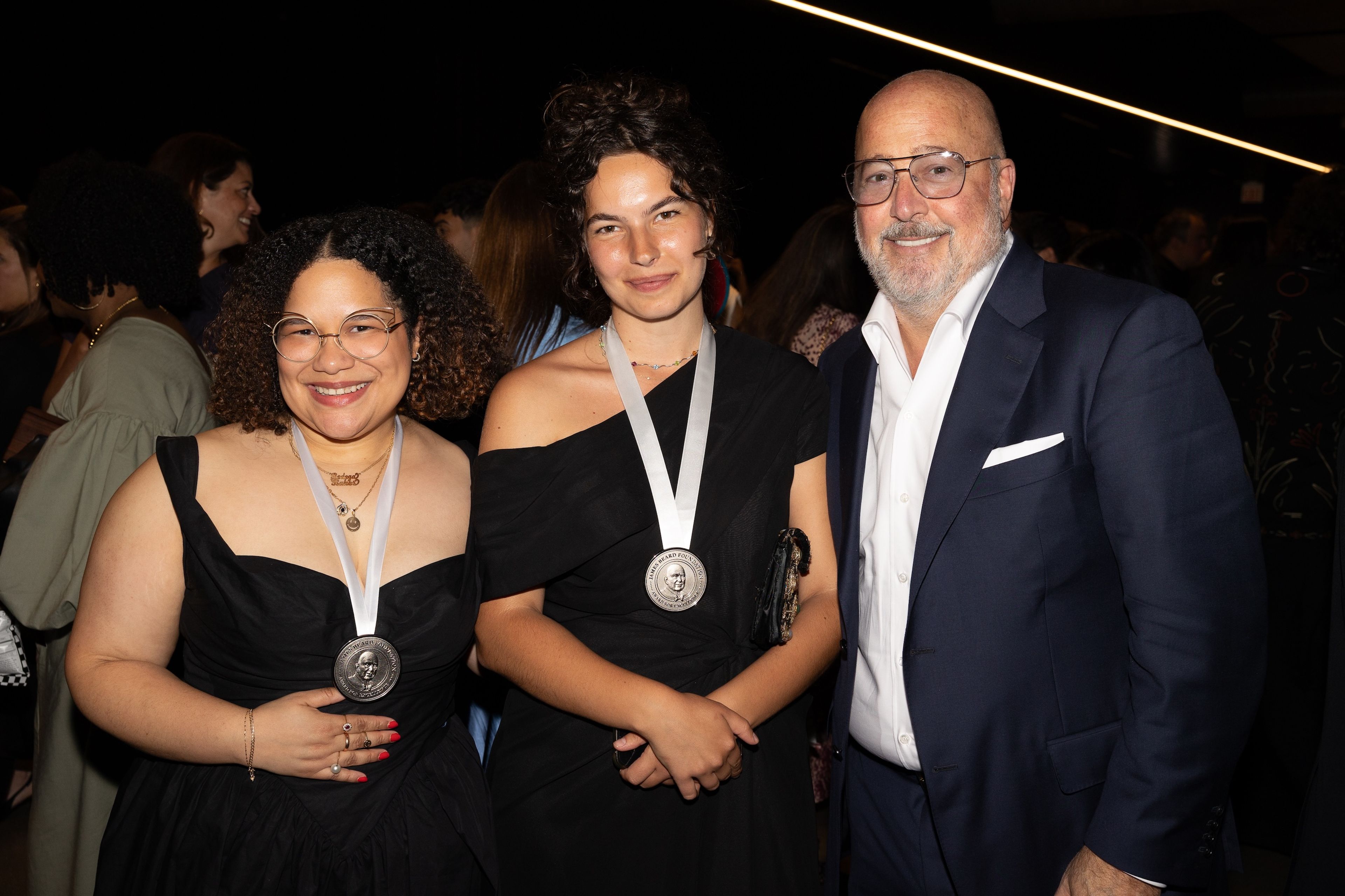 Gelen with Paola Velez and Andrew Zimmern at the 2025 James Beard Media Awards. (Photo: Galdones Photography)