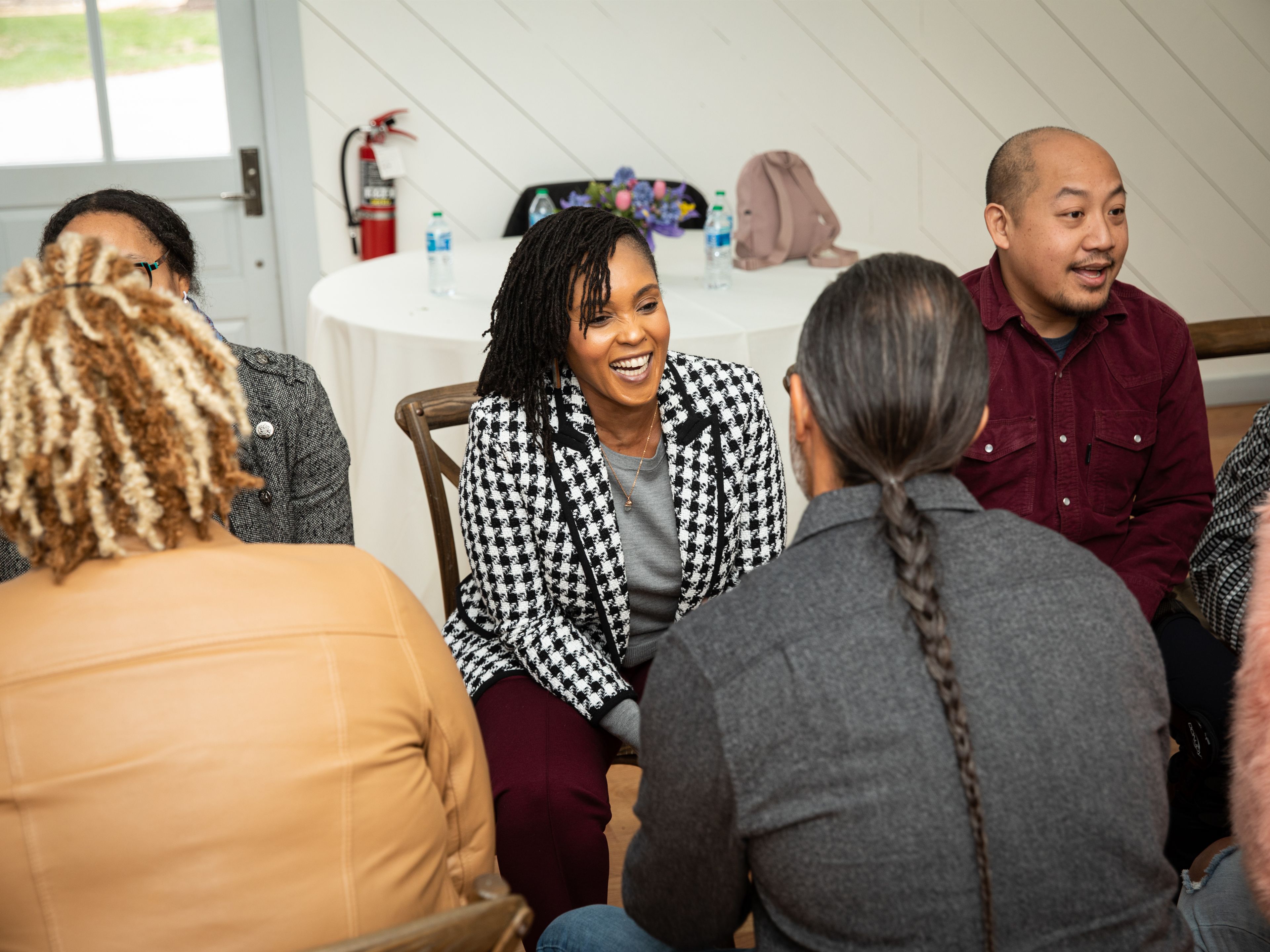 People sitting face to face on chairs