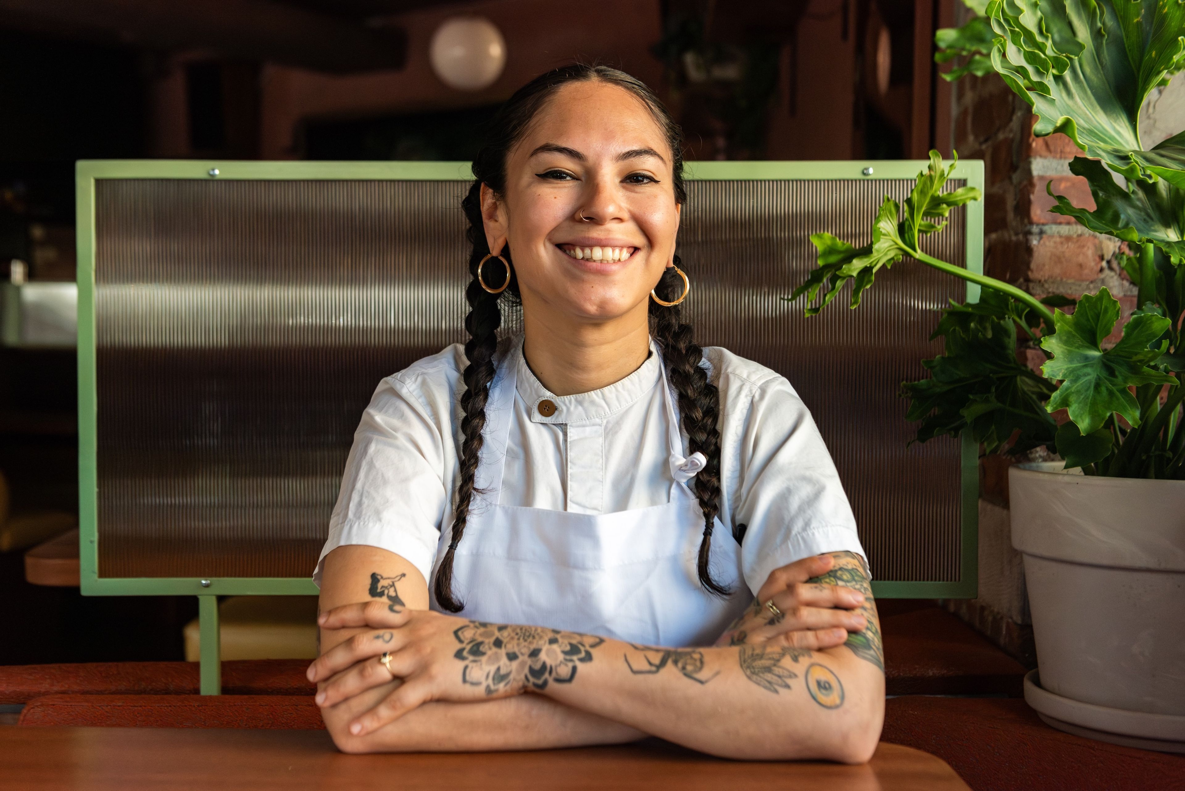 Smiling headshot of Yara Herrera in chef uniform