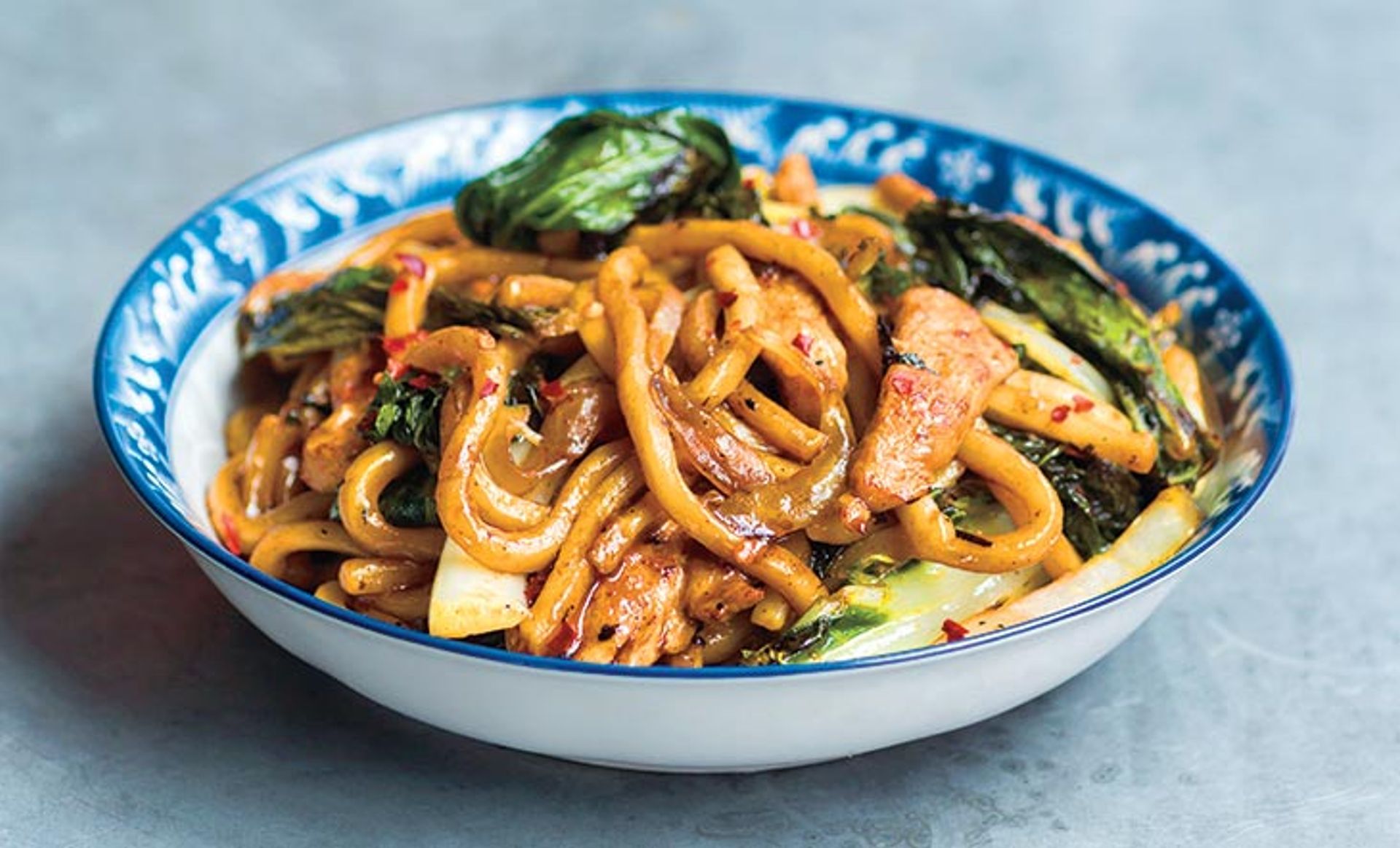 WOK-CHARRED UDON NOODLES WITH CHICKEN AND BOK CHOY