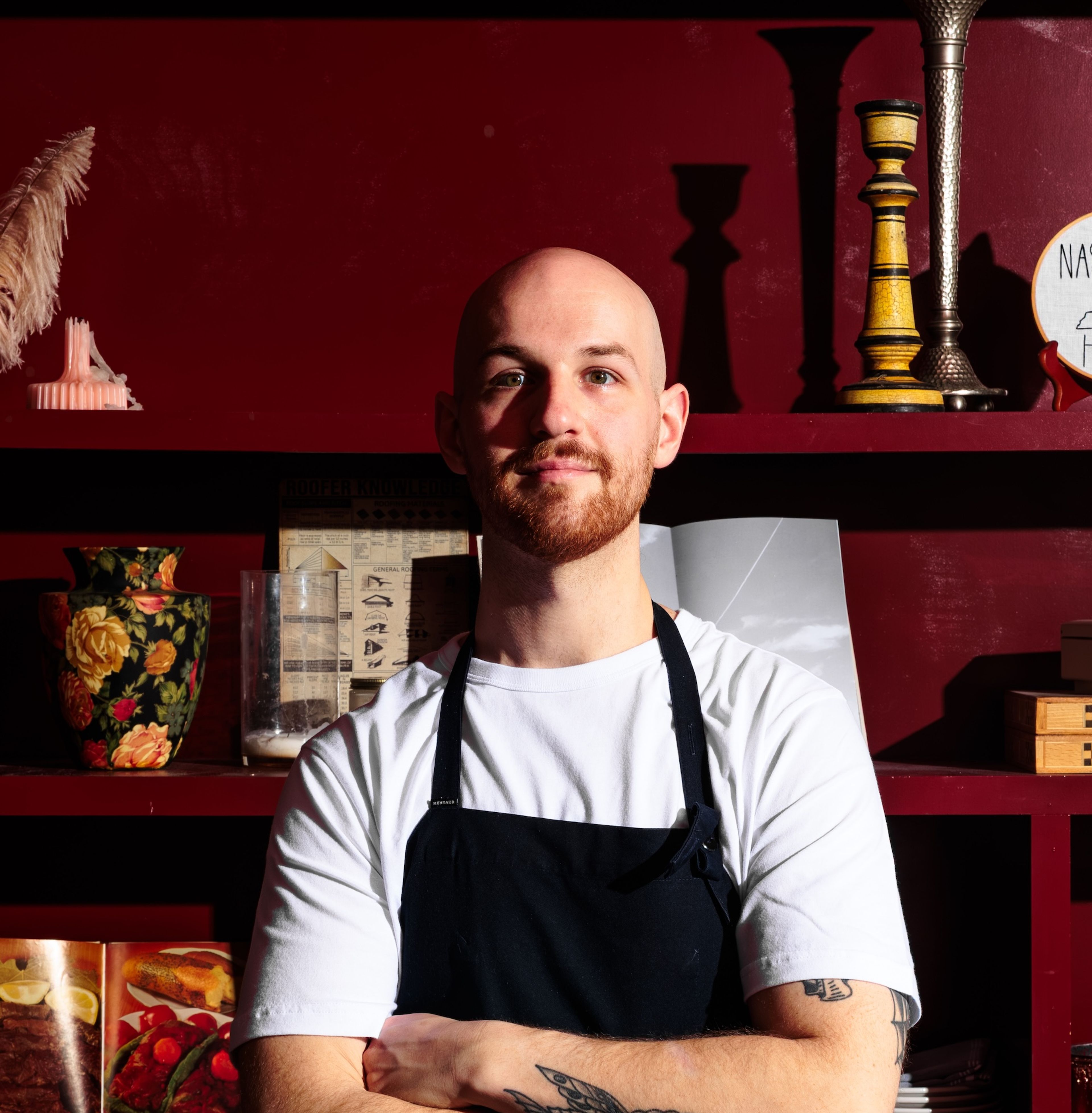 Mathew Meeker in a chef apron