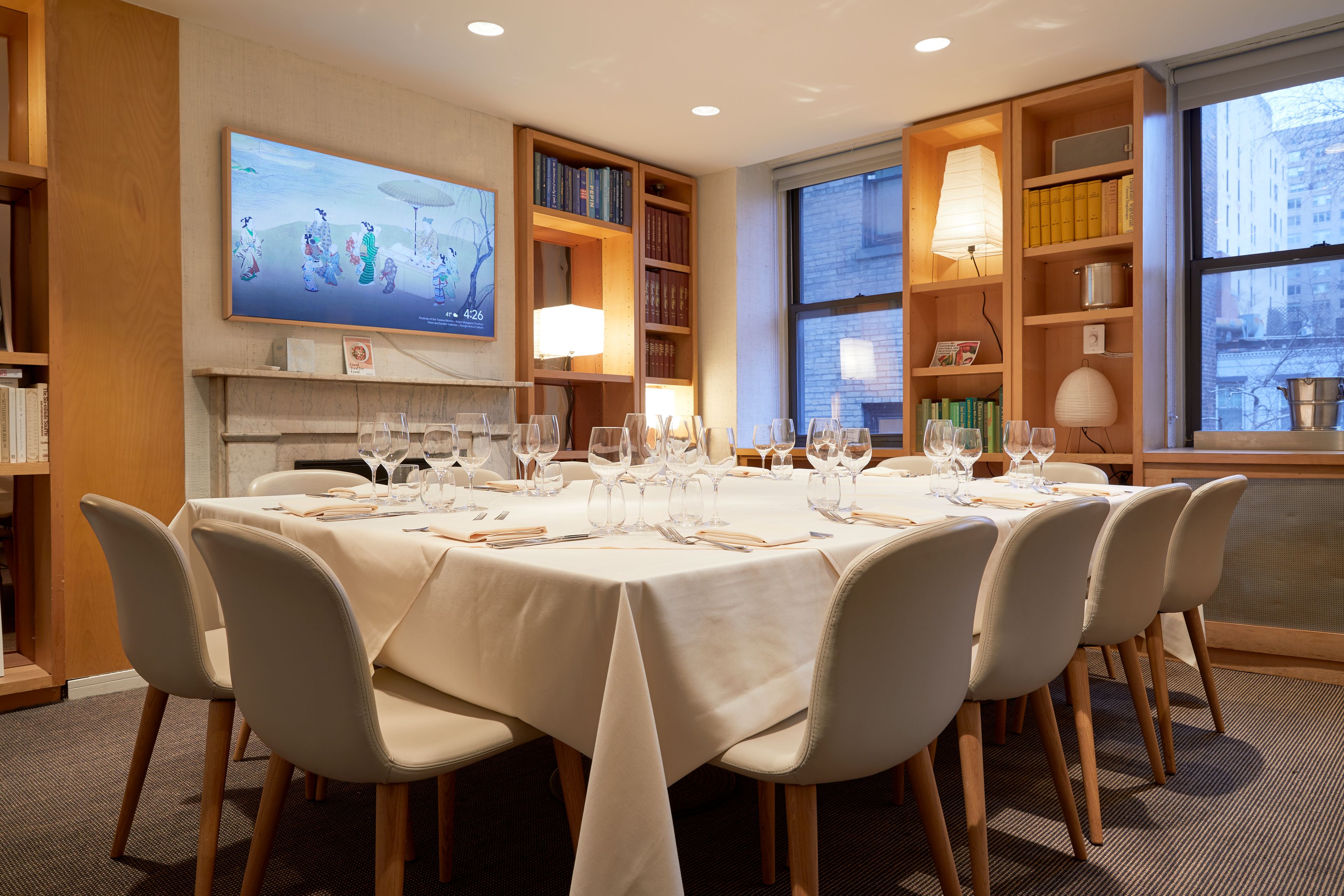 A large table with 12 place settings