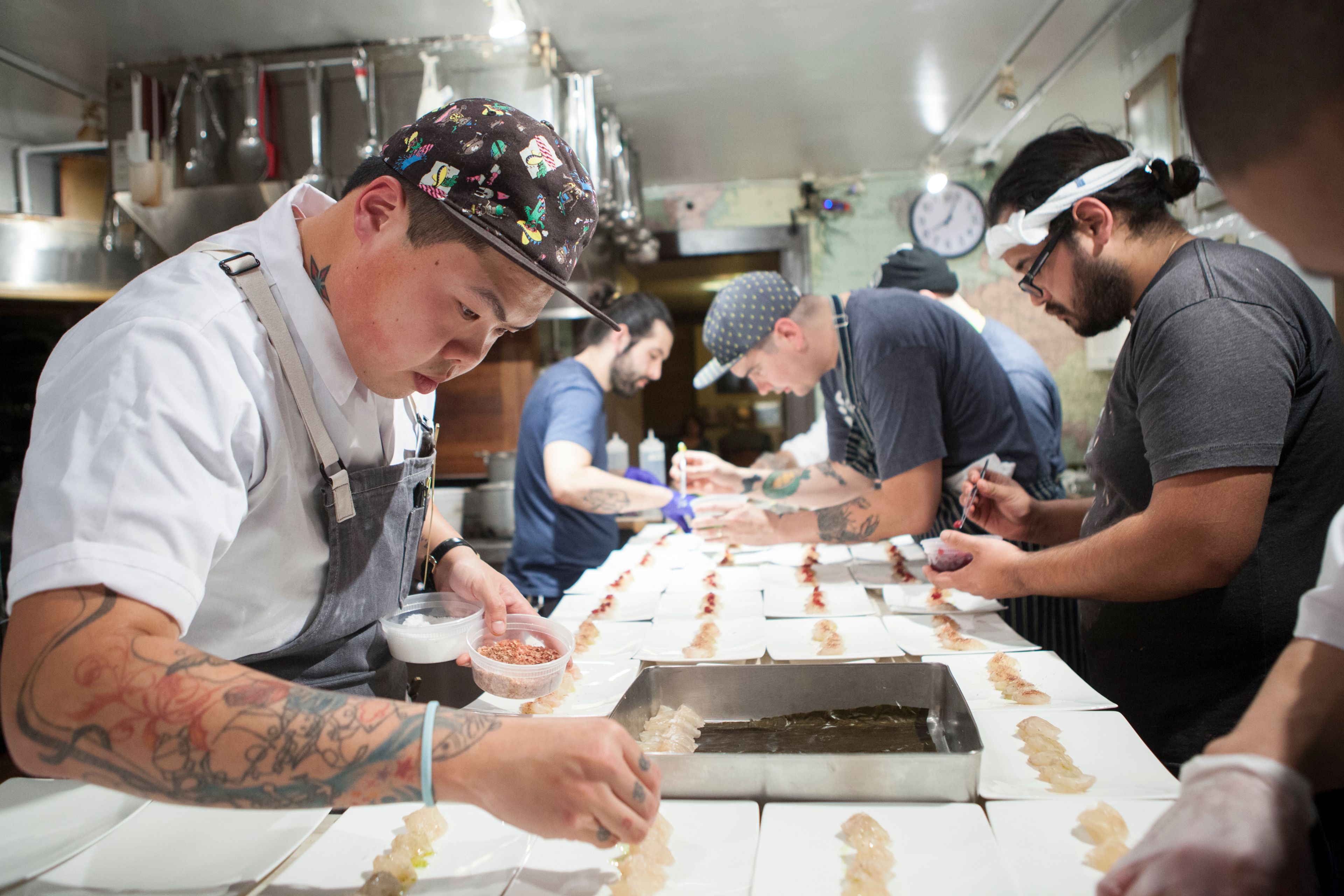 Chefs plating in the Beard House kitchen