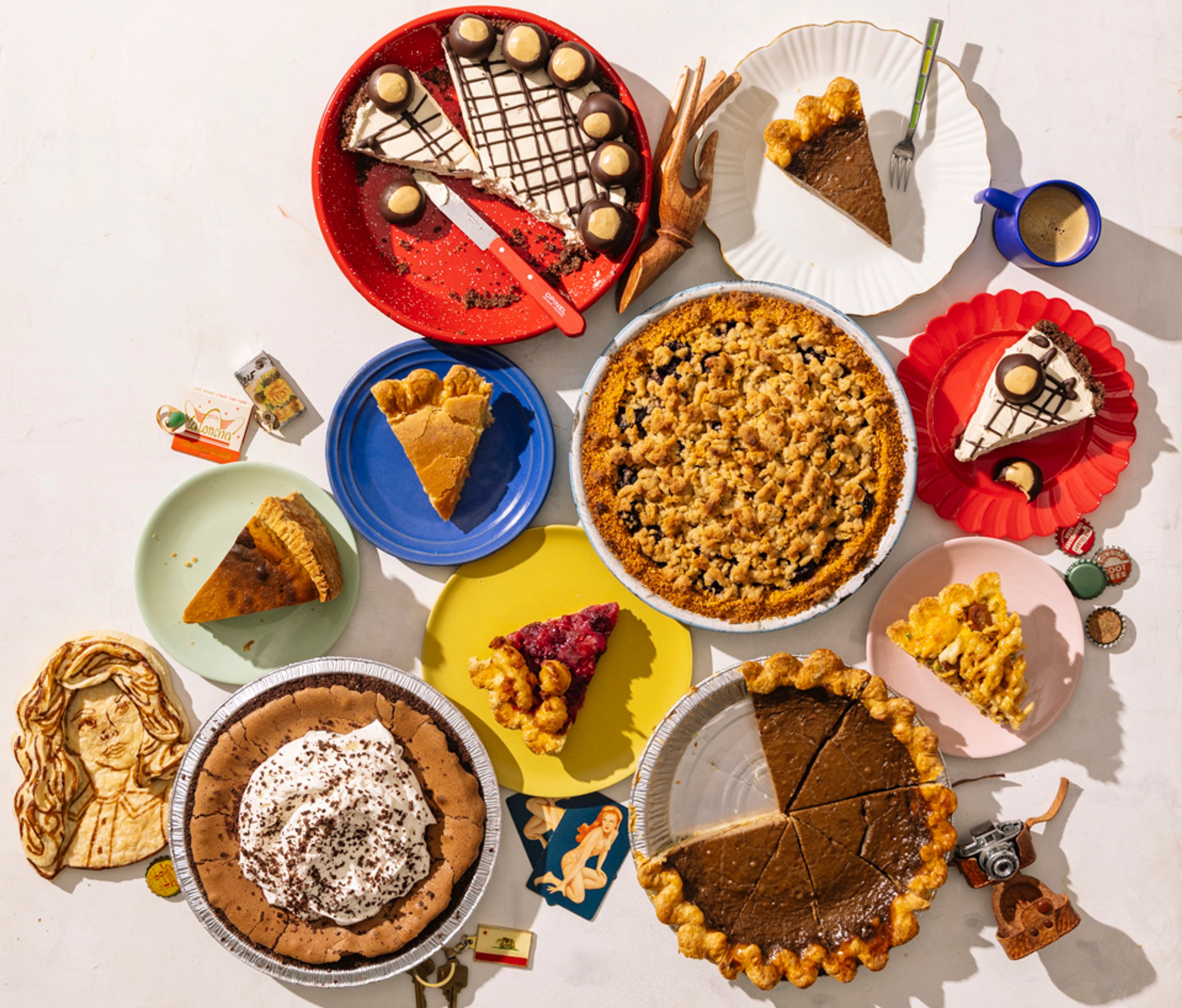 Assorted pies on colorful plates