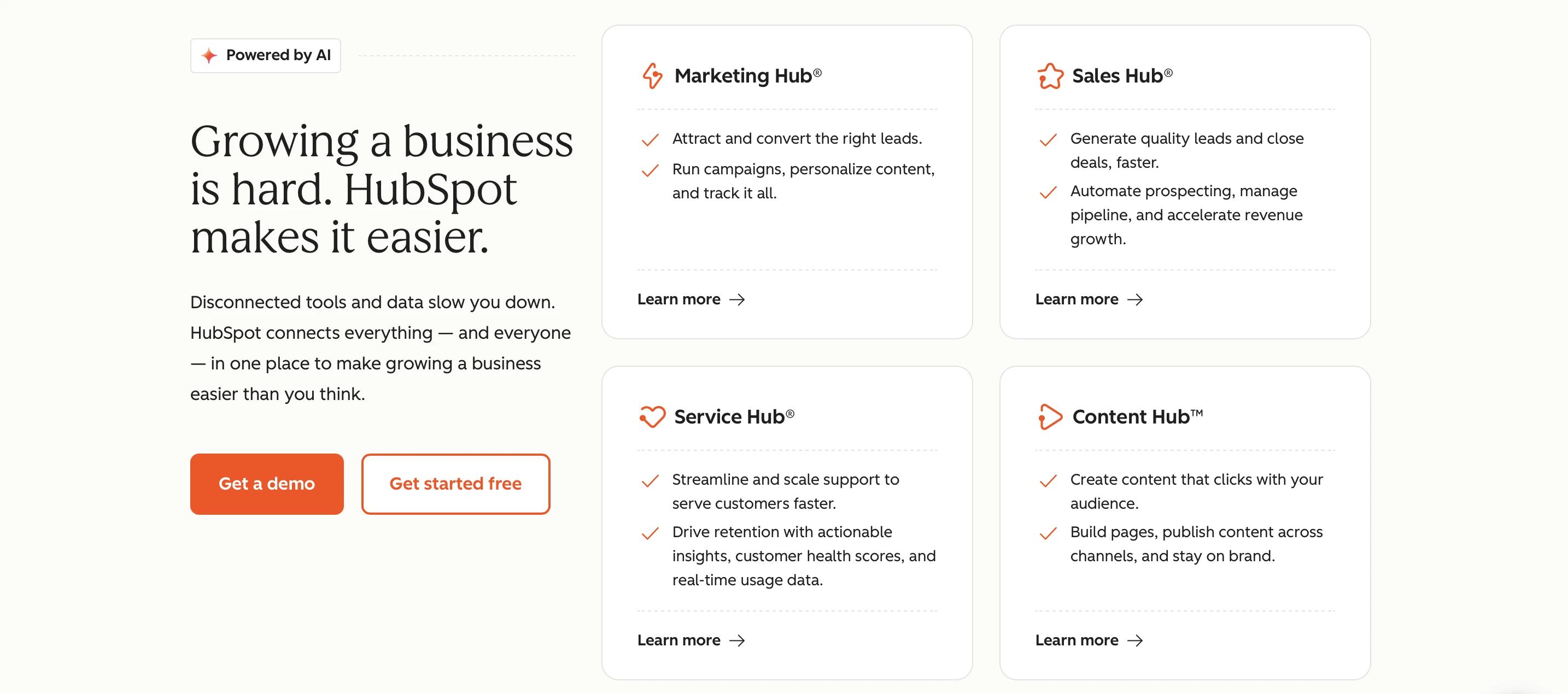 HubSpot hero with solid and outline button-styled links and plain text Learn more links