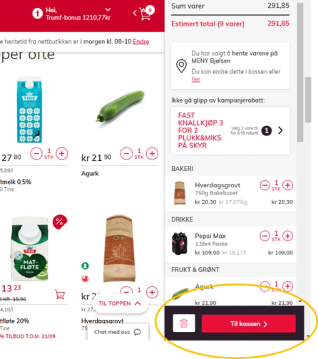 Knapp med teksten 'Til kassen' nederst på skjermen, omgitt av en gul sirkel.