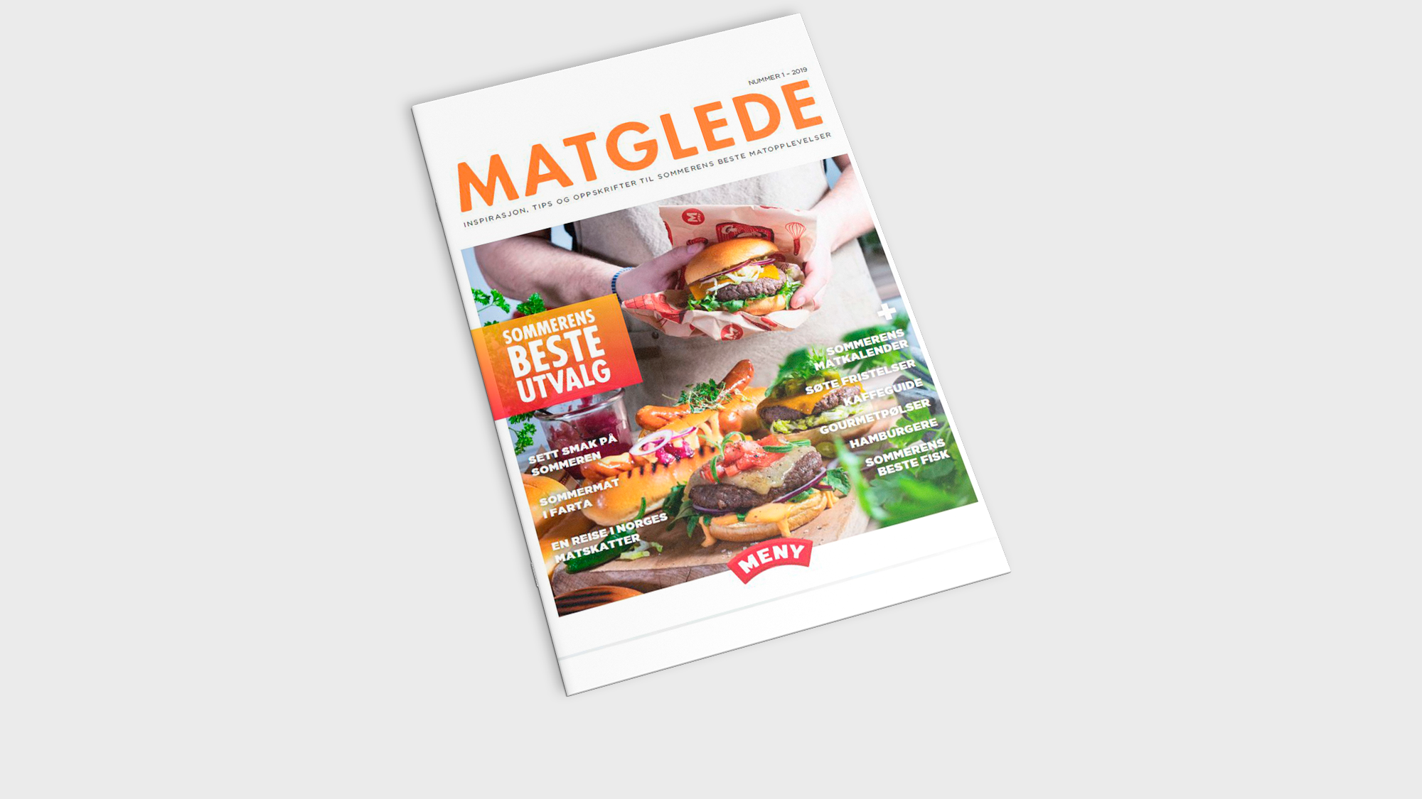 En kokebok med tittelen 'Matglede' og bilder av ulike retter på forsiden.