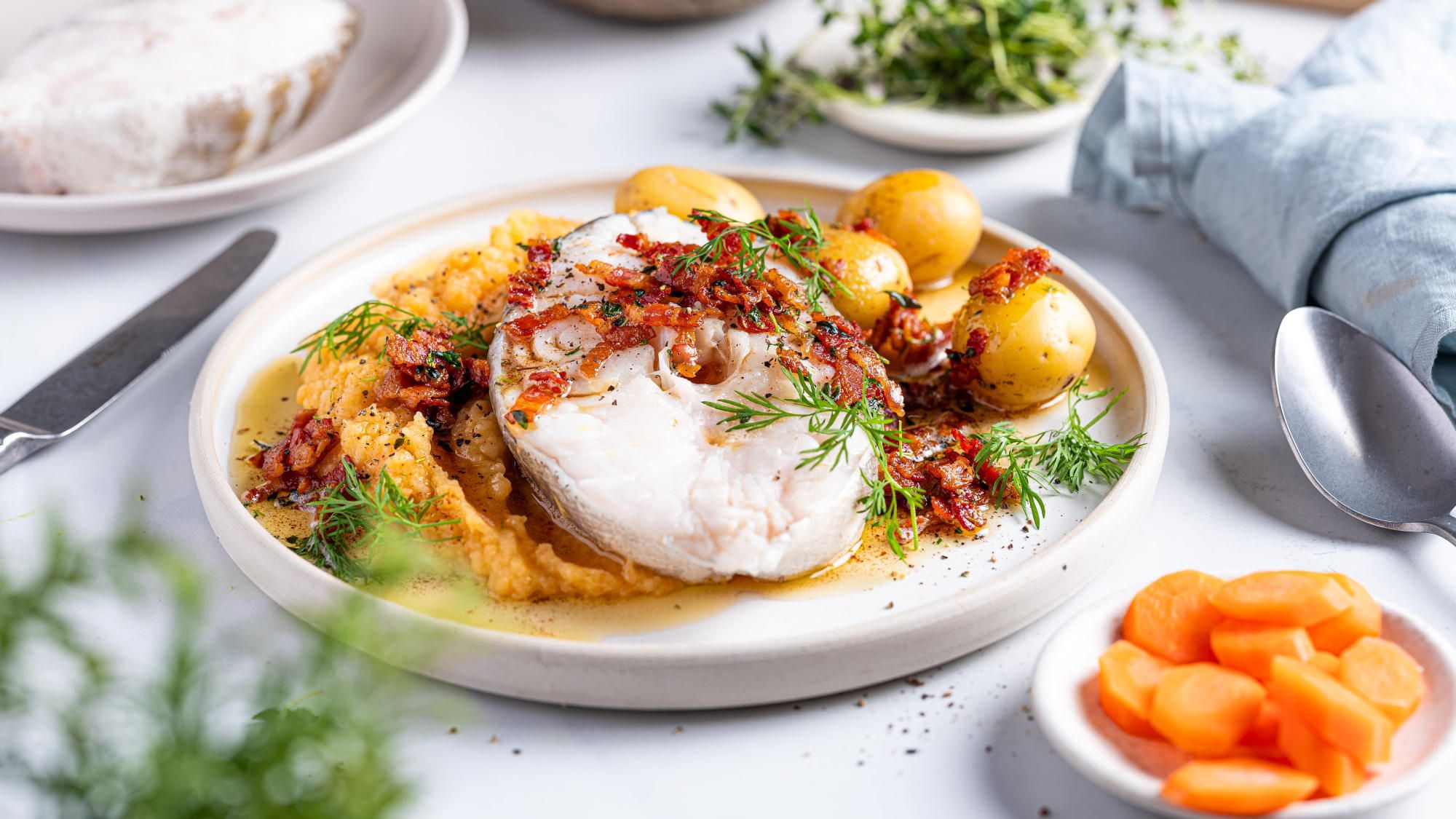 Skrei med rotmos og sprøstekt bacon
