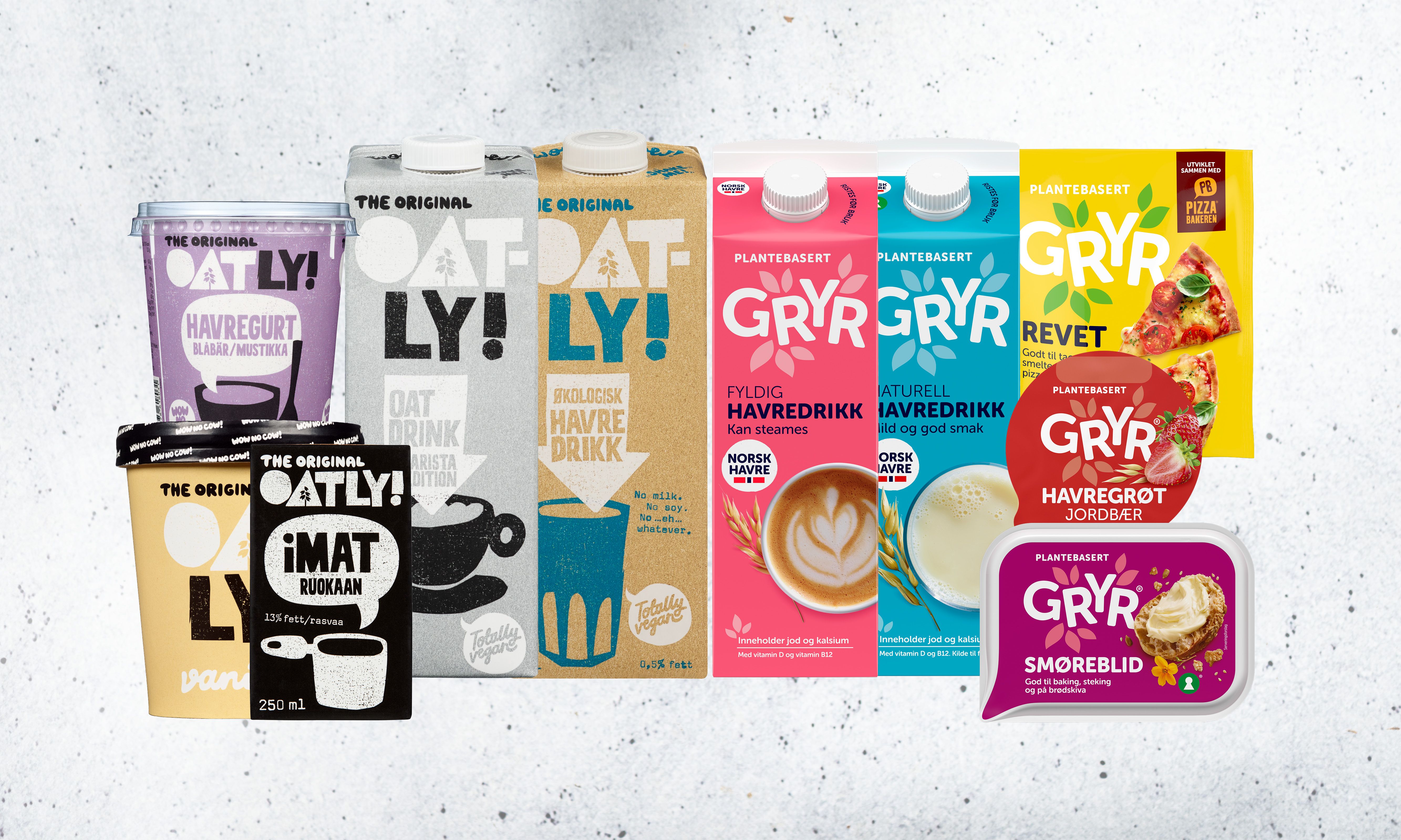 Ulike typer Oatly Gryr-produkter og drikker i ulike farger og emballasjer, plassert på en hvit bakgrunn.