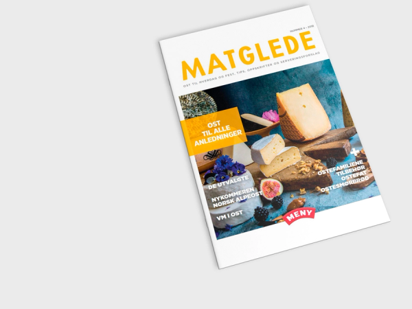 Forside av et ostemagasin fra 2018 med bilder av ost og mat på forsiden.