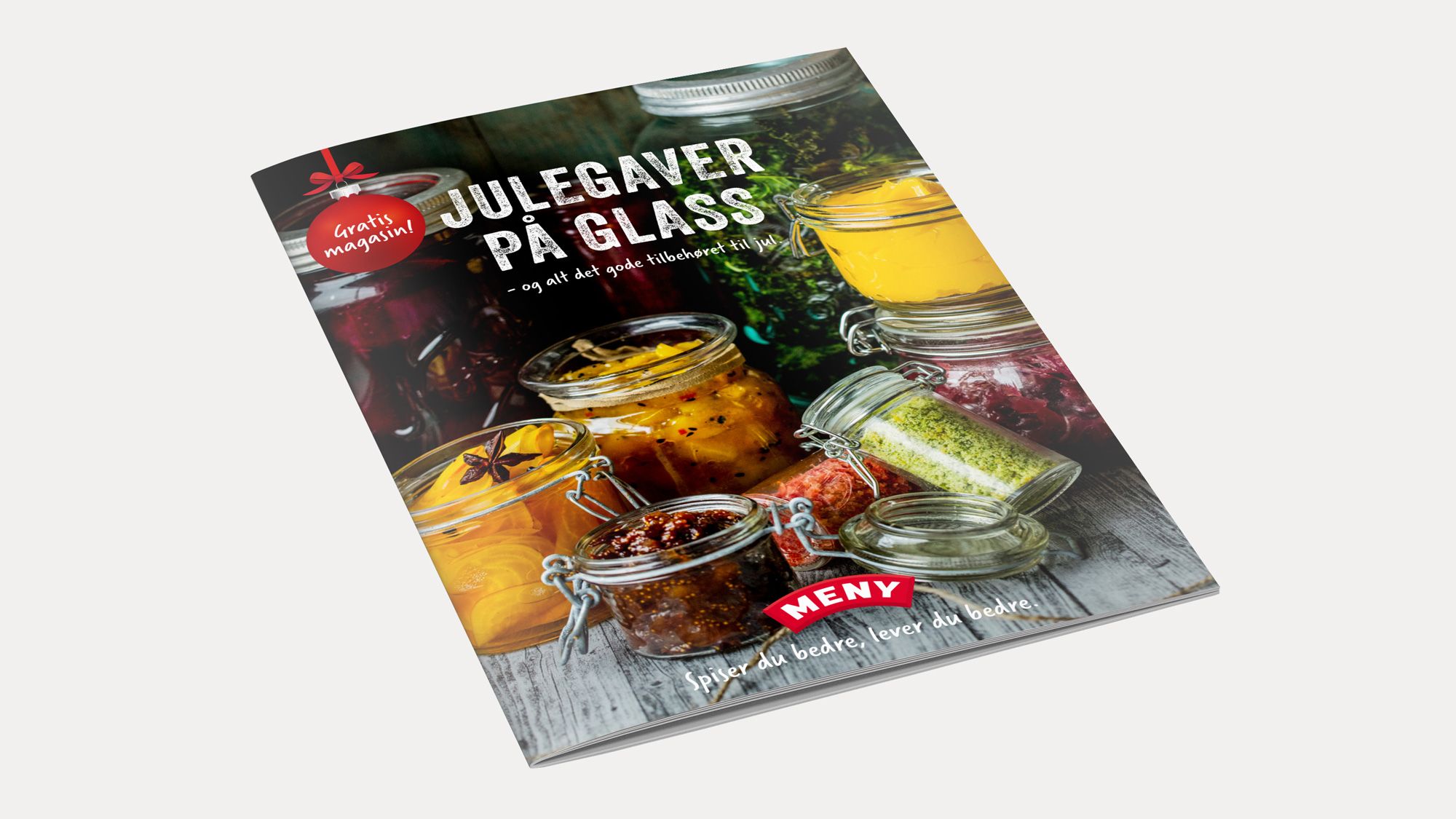 En katalog med julegaver på glass, med bilder av ulike glass og innhold som syltetøy og drikke, fra 2015.