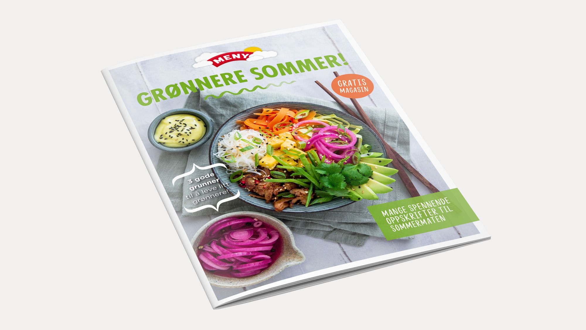 En sommermagasin med en tallerken med taco, salat og tilbehør på forsiden.