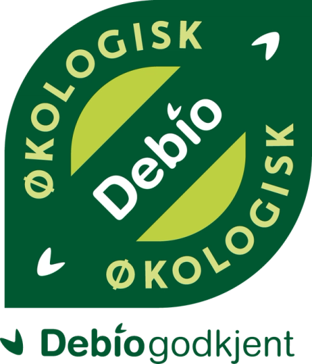 En logo med teksten 'Debio' i midten, omgitt av en grønn sirkel med ordene 'Økologisk' og 'Økologisk' på utsiden, og en liten grønn hake nederst med teksten 'Debiogodkjent'.