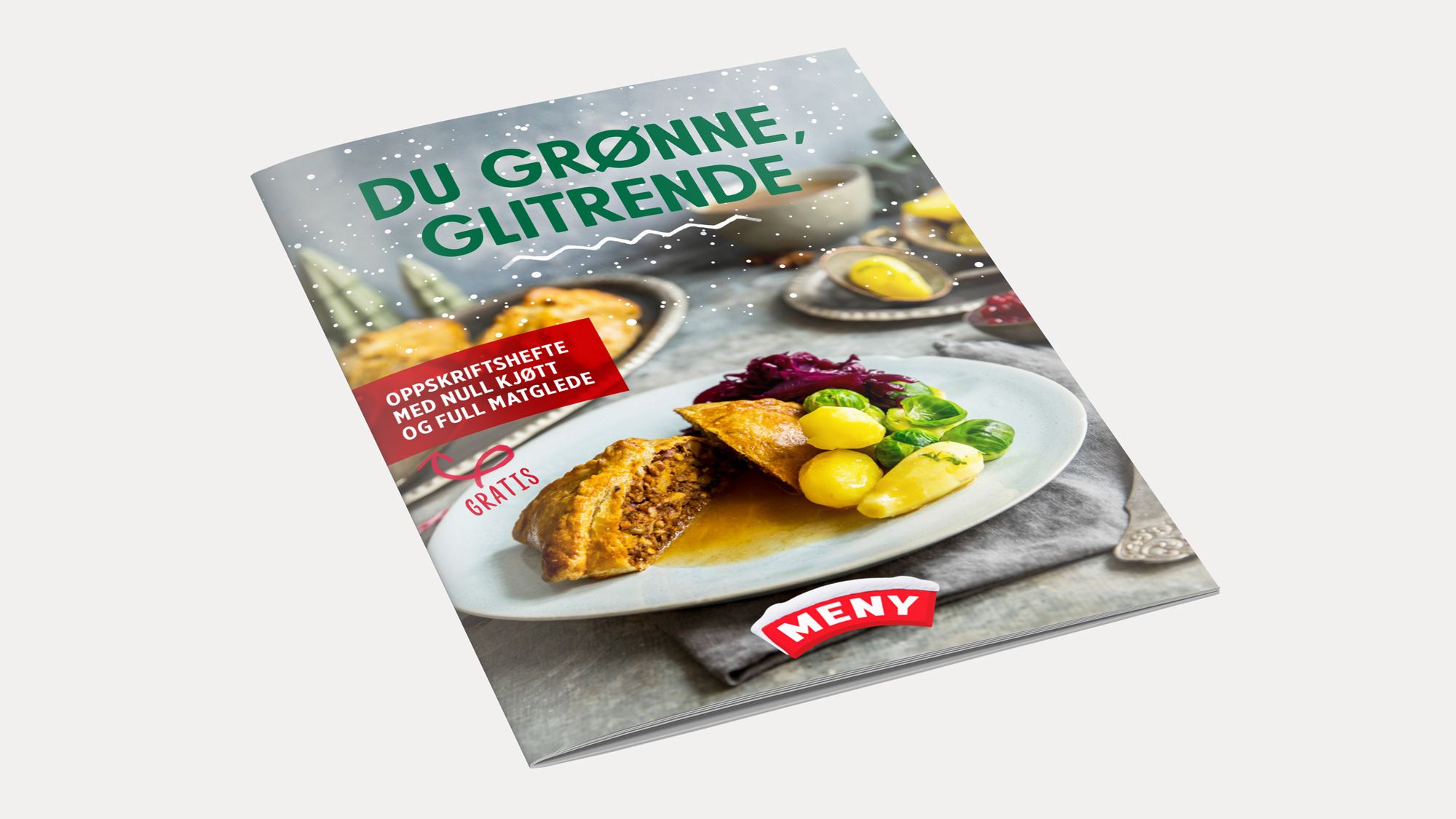 Forside av et matmagasin med en julemiddag og grønne grønnsaker på et fat, med teksten 'Du grønne, glitrende' på forsiden.