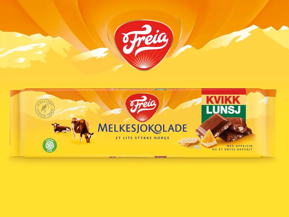 Freia Melkesjokolade med kvikk lunsj på emballasjen, med en gul bakgrunn og Freia-logo øverst.
