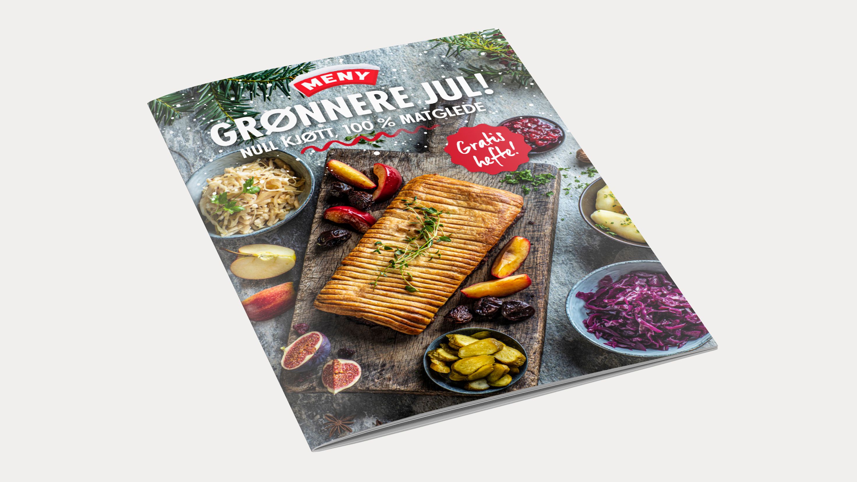 Forside av en julematbok med bilder av ribbe, medisterkaker og tilbehør, og teksten 'GOD JUL' på forsiden.