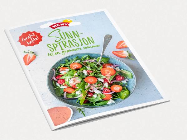 Forside av et sommermagasin med en salat i en bolle og teksten 'Sunn Spirasjon' på forsiden