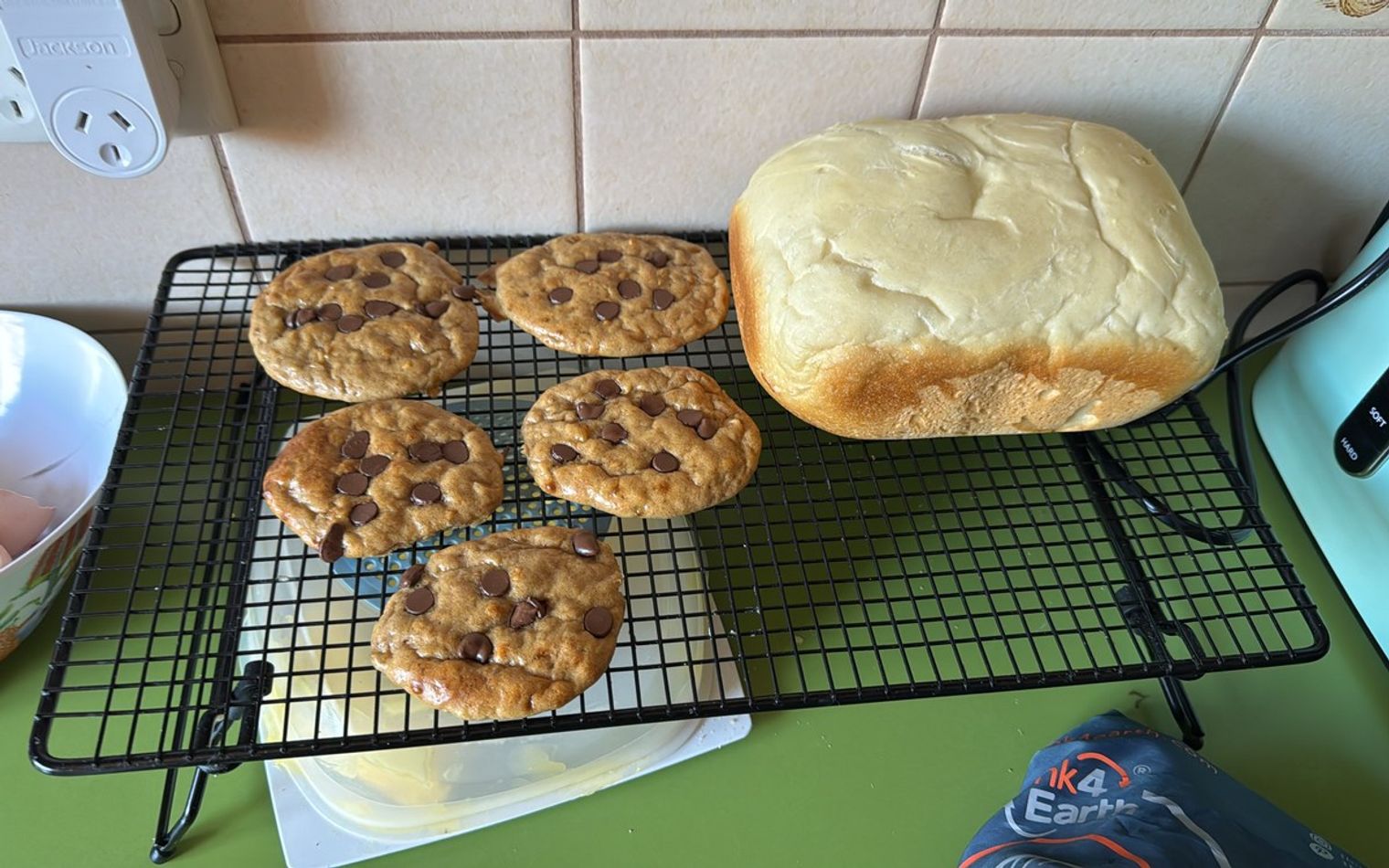 Home-baked goods cooling on a rack in a home kitchen