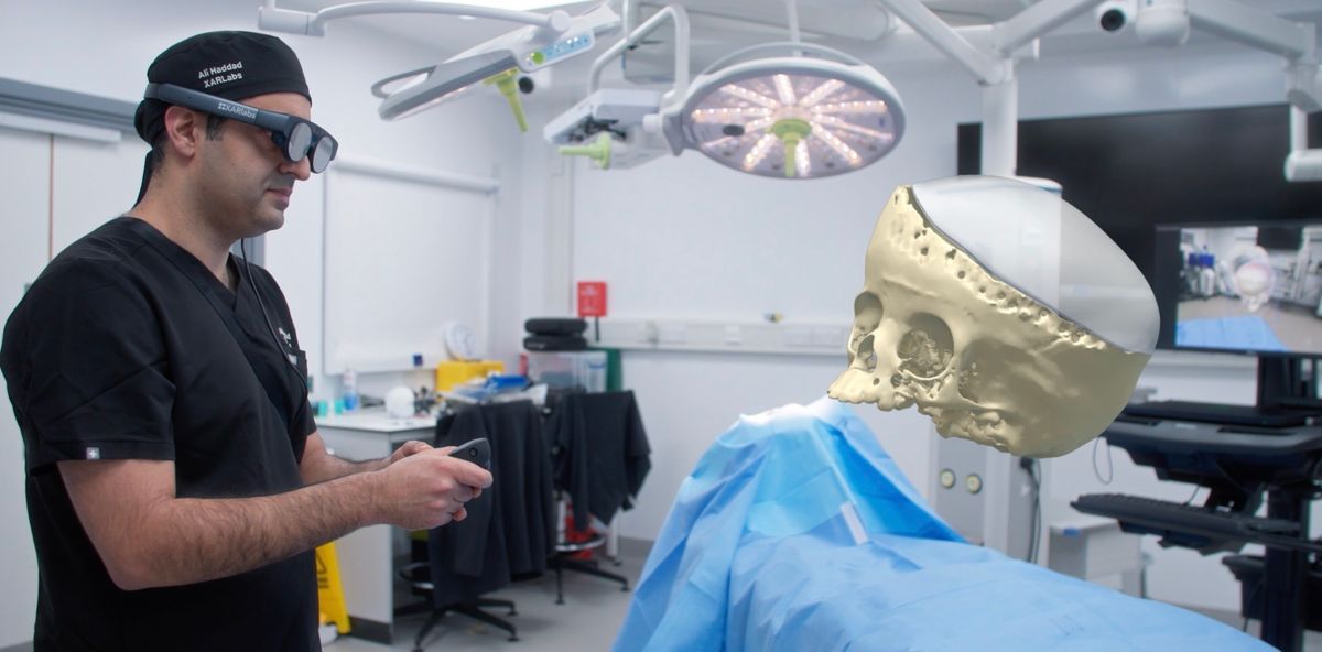 Surgical team planning the separation of craniopagus twins in mixed reality