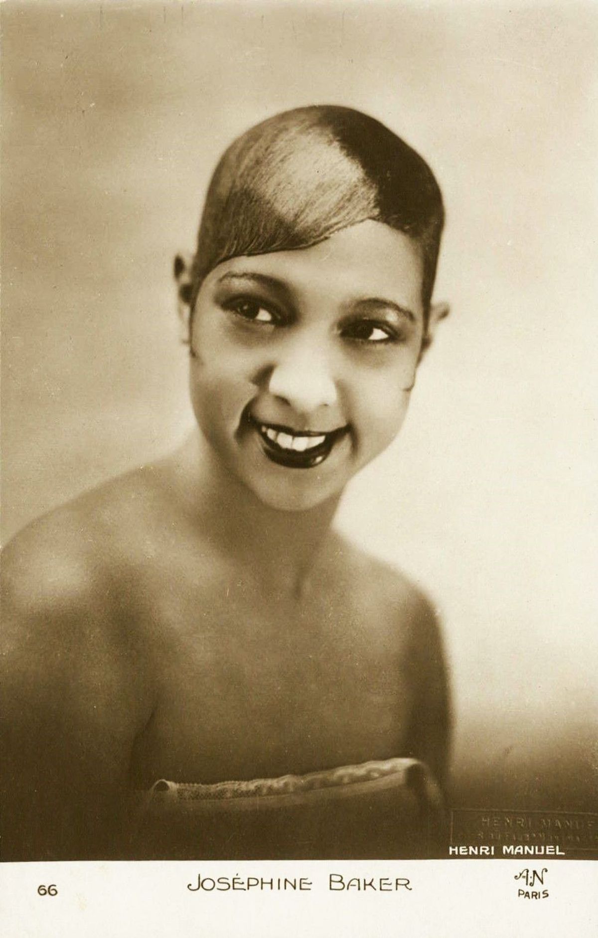 A sepia studio portrait of Josephine Baker, bare shouldered and smiling, her hair sculpted close to the head, with her name printed beneath the image.