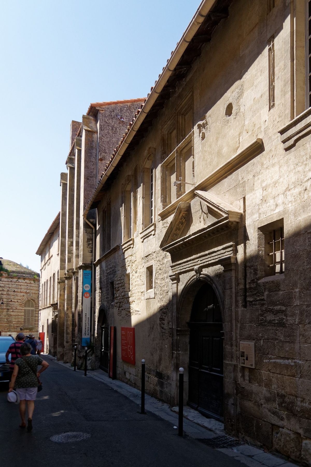 The facade of the musée Réattu in Arles, a stone building on the bank of the Rhône.