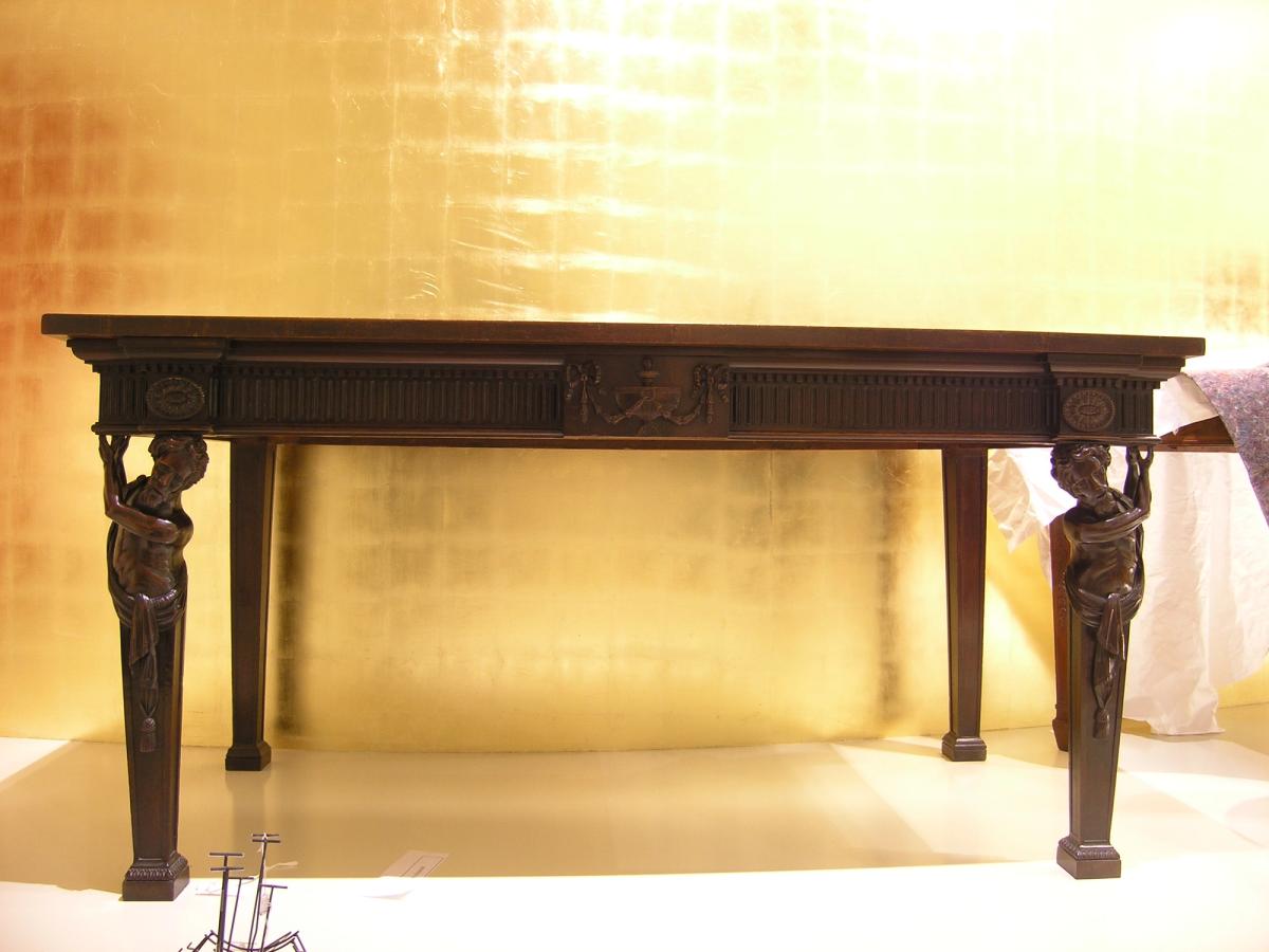 A fine eighteenth century mahogany sideboard table with tapered legs and inlaid decoration.