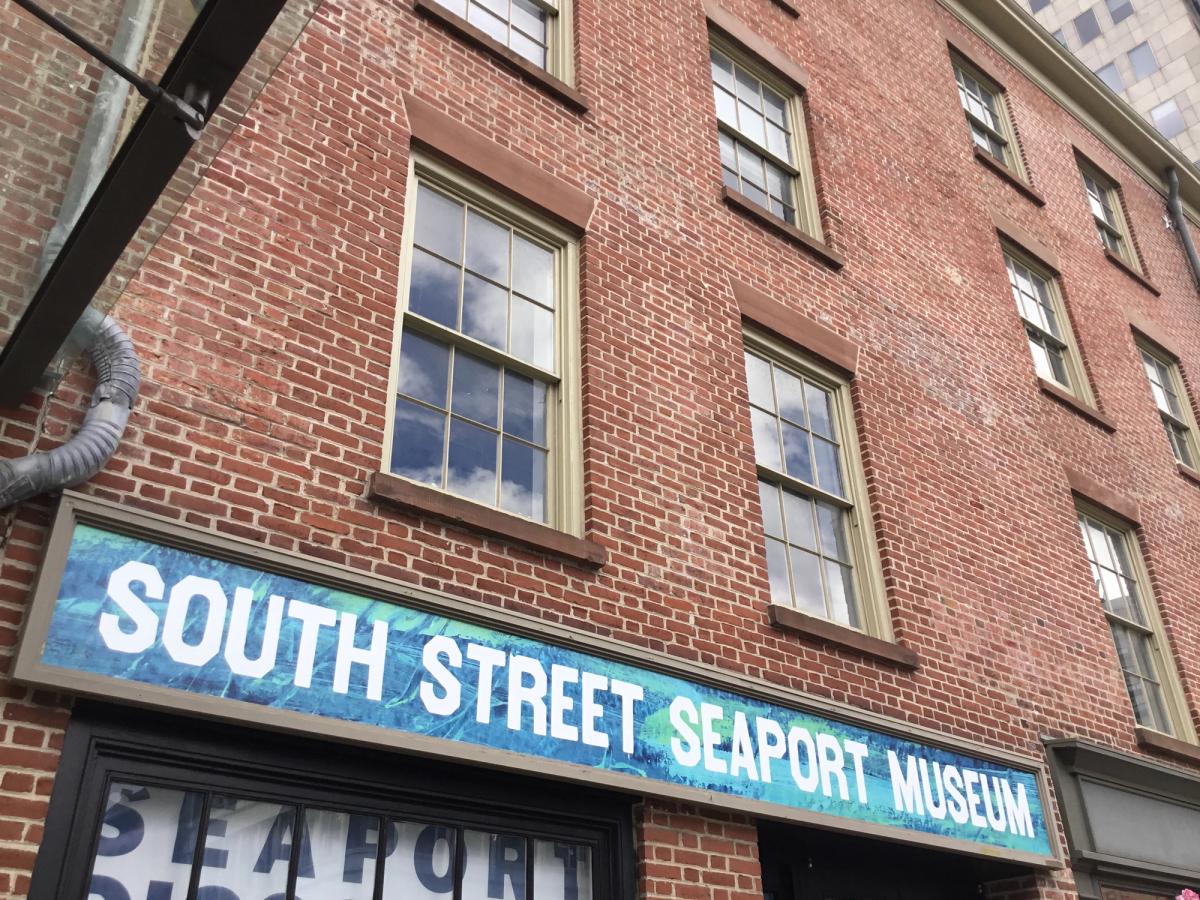 South Street Seaport Museum waterfront, New York, the historic Lower Manhattan district that now houses the Tin Building and the Balloon Museum's inaugural permanent US location.