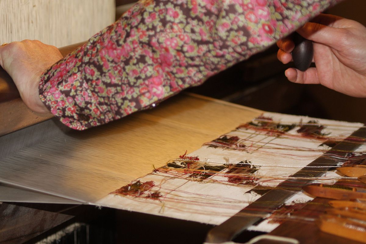 Silk weaving equipment in Lyon, the historic center of French silk printing and weaving.