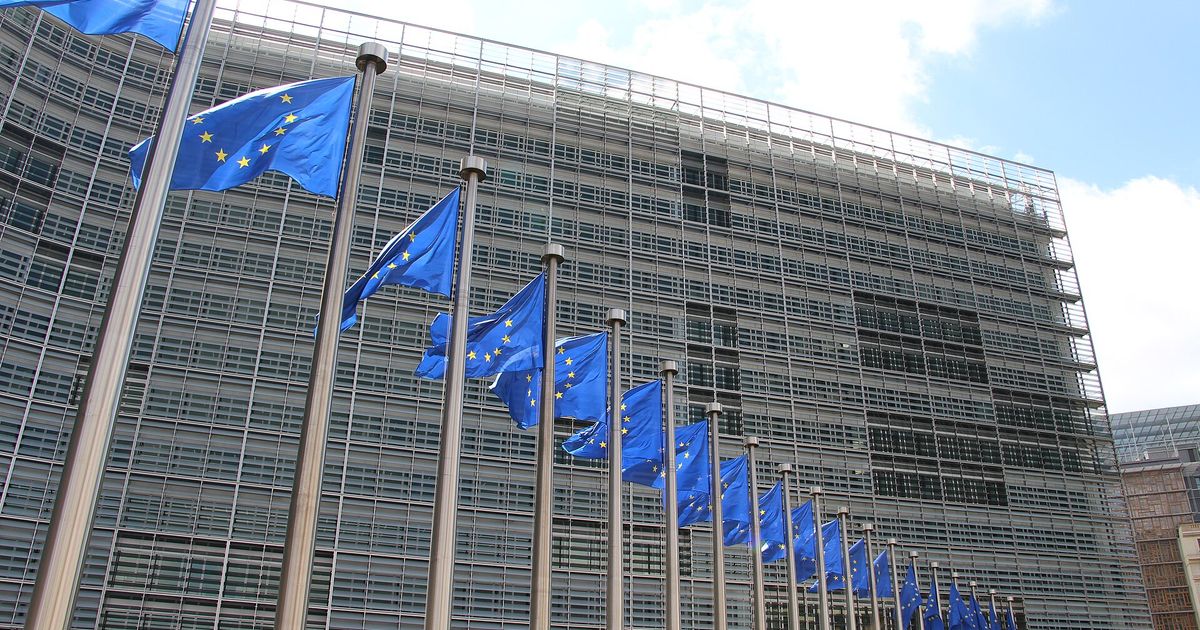 European Union flags in front of the Berlaymont building, seat of the European Commission, in Brussels.