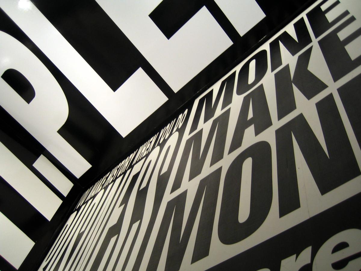 Barbara Kruger installation at the Australian Centre for Contemporary Art in Melbourne, showing bold text-image montage critiquing consumerism and power