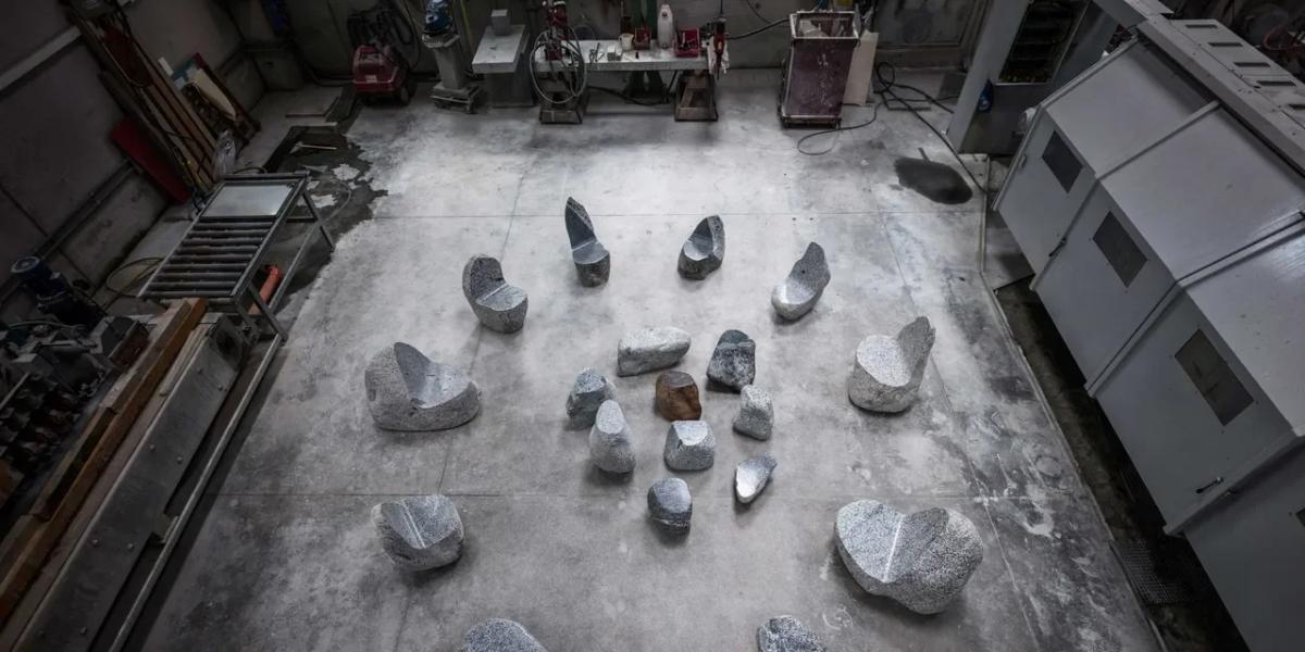 Max Lamb 's stone works from the Elements series: the material manifestation of the Sovereign Object, carrying an irreversible labor density and raw material singularity that resists digital flattening.
