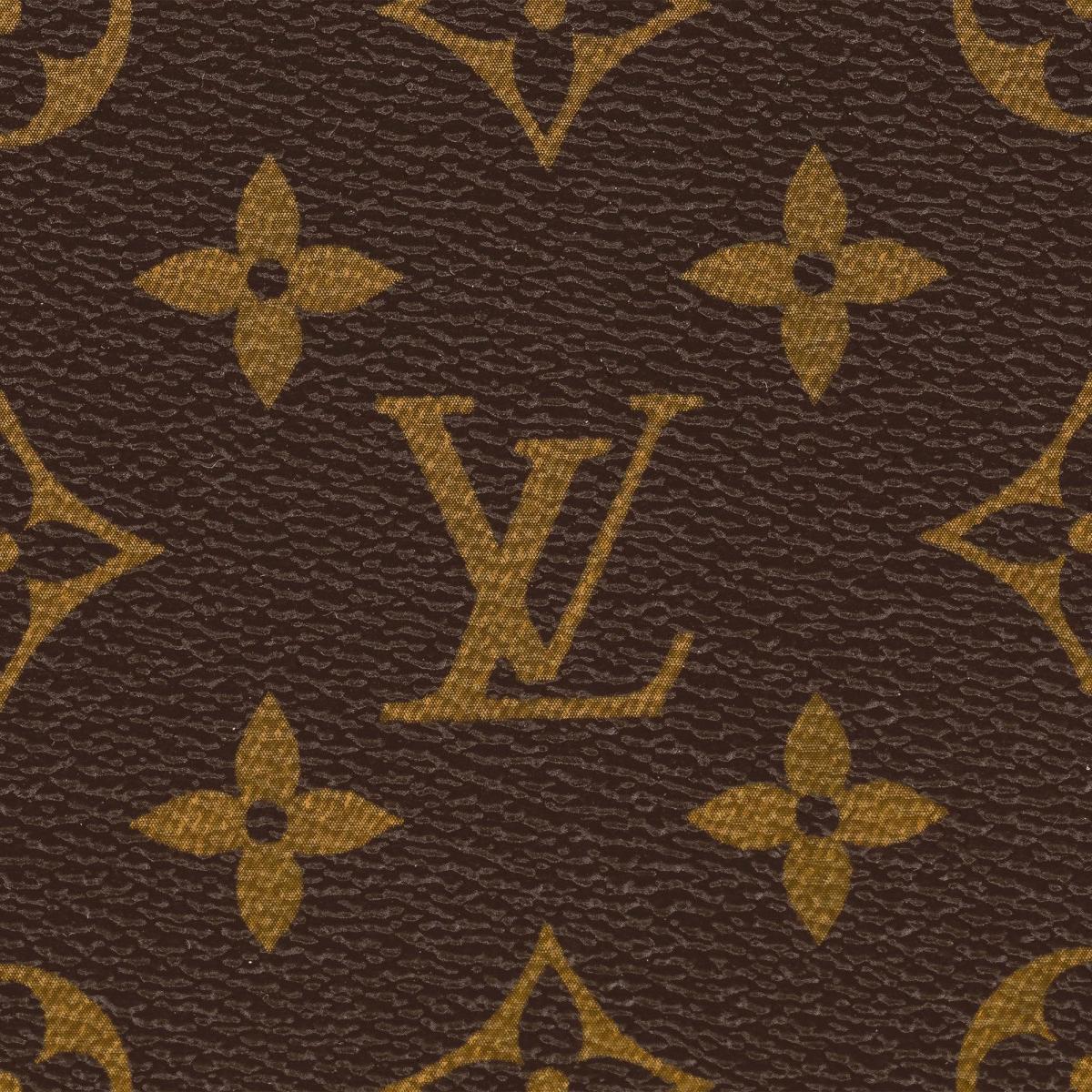 The Simulacrum of Luxury: The instantly recognizable Louis Vuitton monogram, a perfect example of a proprietary symbol that has transcended its material origins to become a signifier of prestige and hierarchical meaning in the hyperreal fashion landscape.