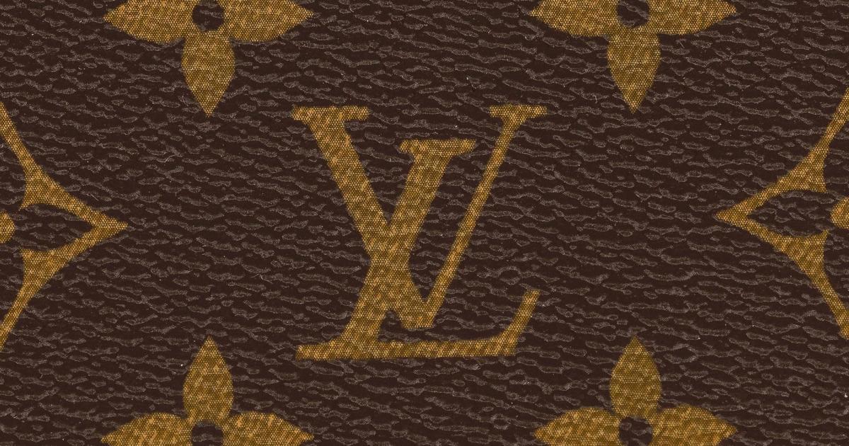 A close view of coated canvas printed with a repeating brown and gold monogram pattern of interlocking letters, quatrefoils and flowers.