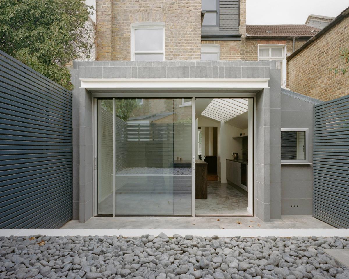 Atmospheric Equity in practice: EBBA Architects’ Basalt House utilizes raw material weight to introduce Tactical Friction into the domestic sphere.