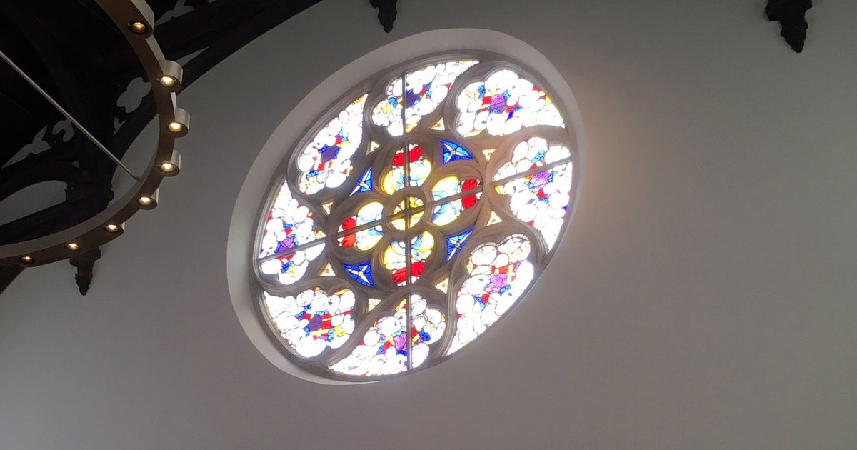 The Gothic Hall of Kneuterdijk Palace in The Hague, a tall vaulted nineteenth century interior with ribbed arches and pale walls.